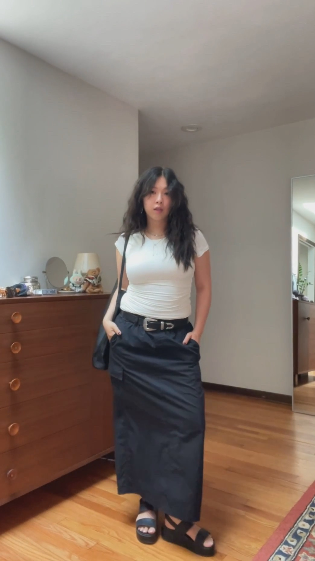 Top is from Amazon! Most flattering baby tshirt - it literally slims you down ohhh the illusion!

Bag is from oak + fort - very spacious and love the shape! Currently on sale as well!

Skirt is from Uniqlo but sold out- I’ve linked some similar ones

Shoes from Crocs and this is just my everyday summer sandal - literally goes with any outfit!! 

Follow @lazzzysundaze for more outfit inspiration 

White top @qinsen_official 
Skirt: @uniqlousa 
Shoes @crocs 
Bag @oakandfort 

#outfitreels #momootd #coolgirlstyle #summeroutfit #silverjewelry #outfitoftheday 

#LTKItBag #LTKFindsUnder50 #LTKSaleAlert