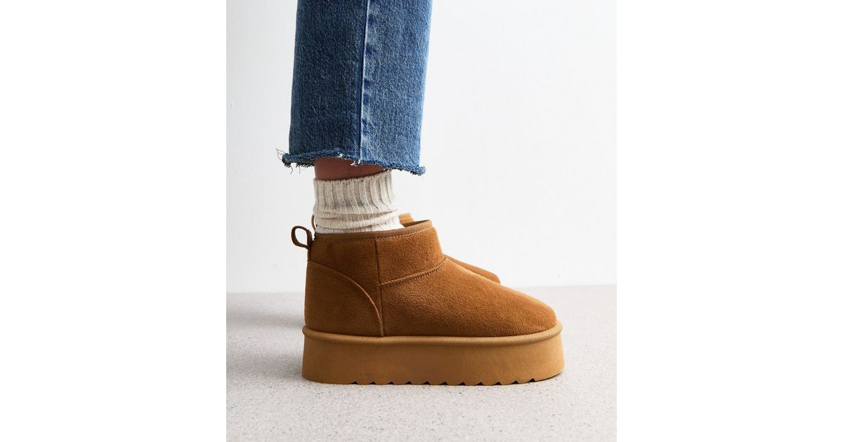 Tan Suedette Faux Fur Lined Chunky Flatform Boots
						
						Add to Saved Items
						Remove fr... | New Look (UK)