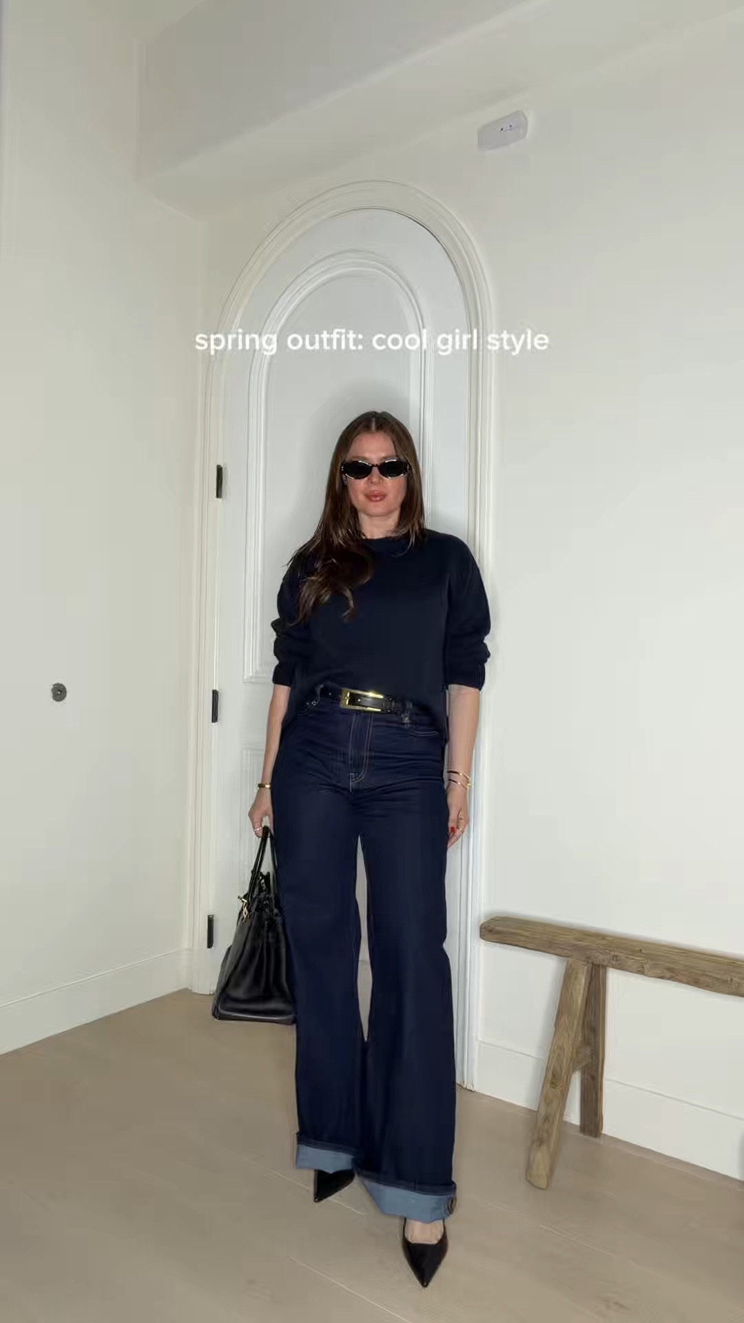 Styling chic @Aureum Collective black belt with a navy blue sweater, dark wash denim high waist wide leg jeans, strappy black sling backs, a classy black heremes 35 tote and 90s retro sunnies. Adding gold jewelry to elevate the look. A perfect effortless and chic spring outfit. Wearing sweater size S, jeans size 4
#springoutfits #chic #coolgirlstyle #effortless 

#LTKSeasonal #LTKgrwm #LTKootd