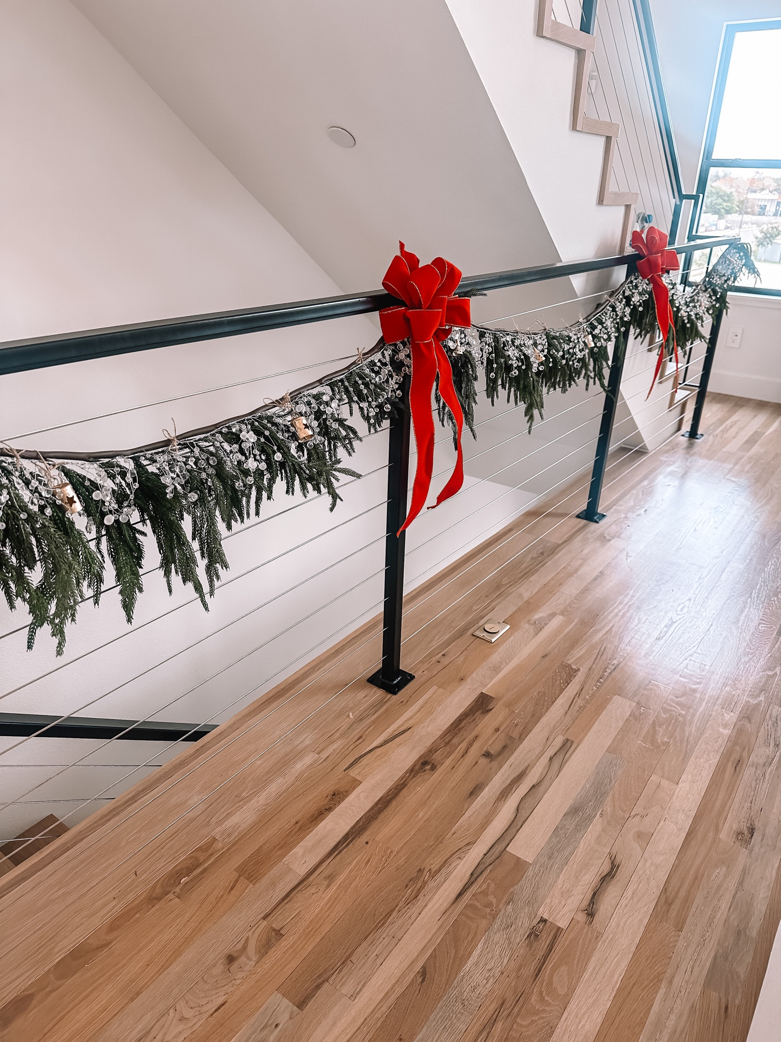 Holiday Christmas decorations 
Stair railing garland 


#LTKSeasonal #LTKhome #LTKHoliday