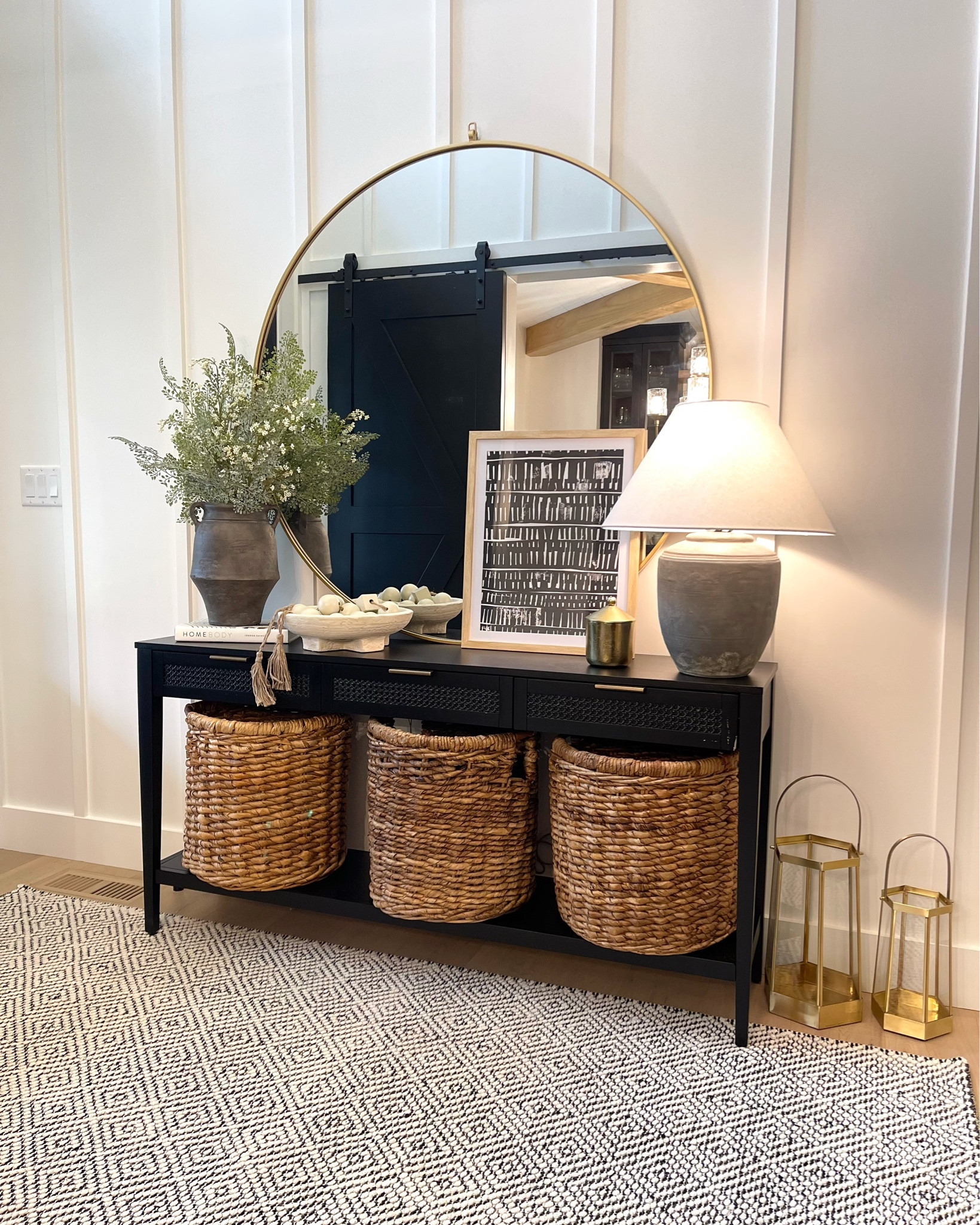 Been waiting to decorate this entry way for 18 months! Now that our build is done I can decorate to my hearts content.  The extra large mirror pack a punch and makes a great statement piece.

#LTKhome