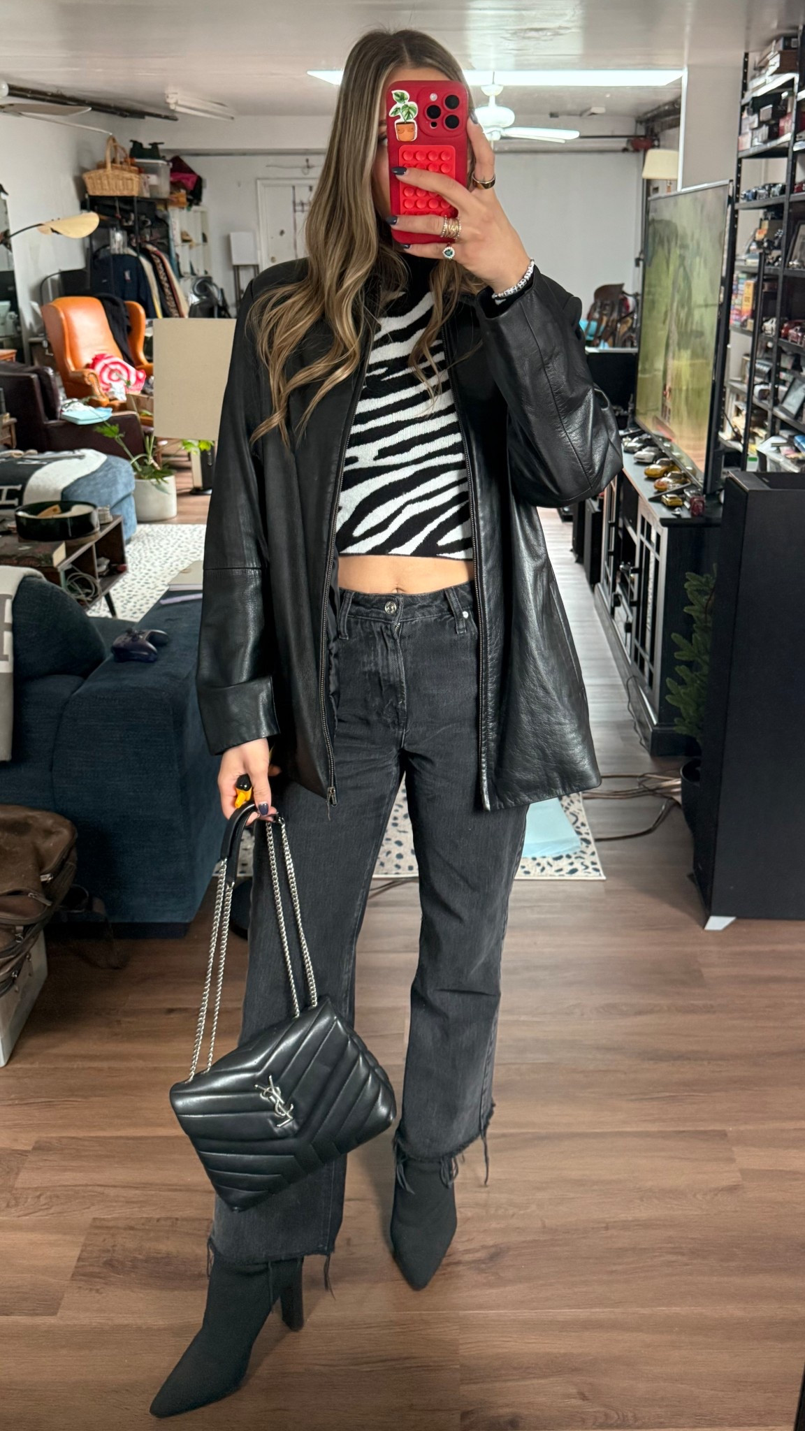 Sunday basics. Zebra print sweater. Zara straight leg ankle jeans. Schutz sock boots. Leather jacket. Perfect spring transition outfit. Zara has similar jacket but can’t tag!

#LTKFindsUnder100 #LTKSeasonal #LTKStyleTip
