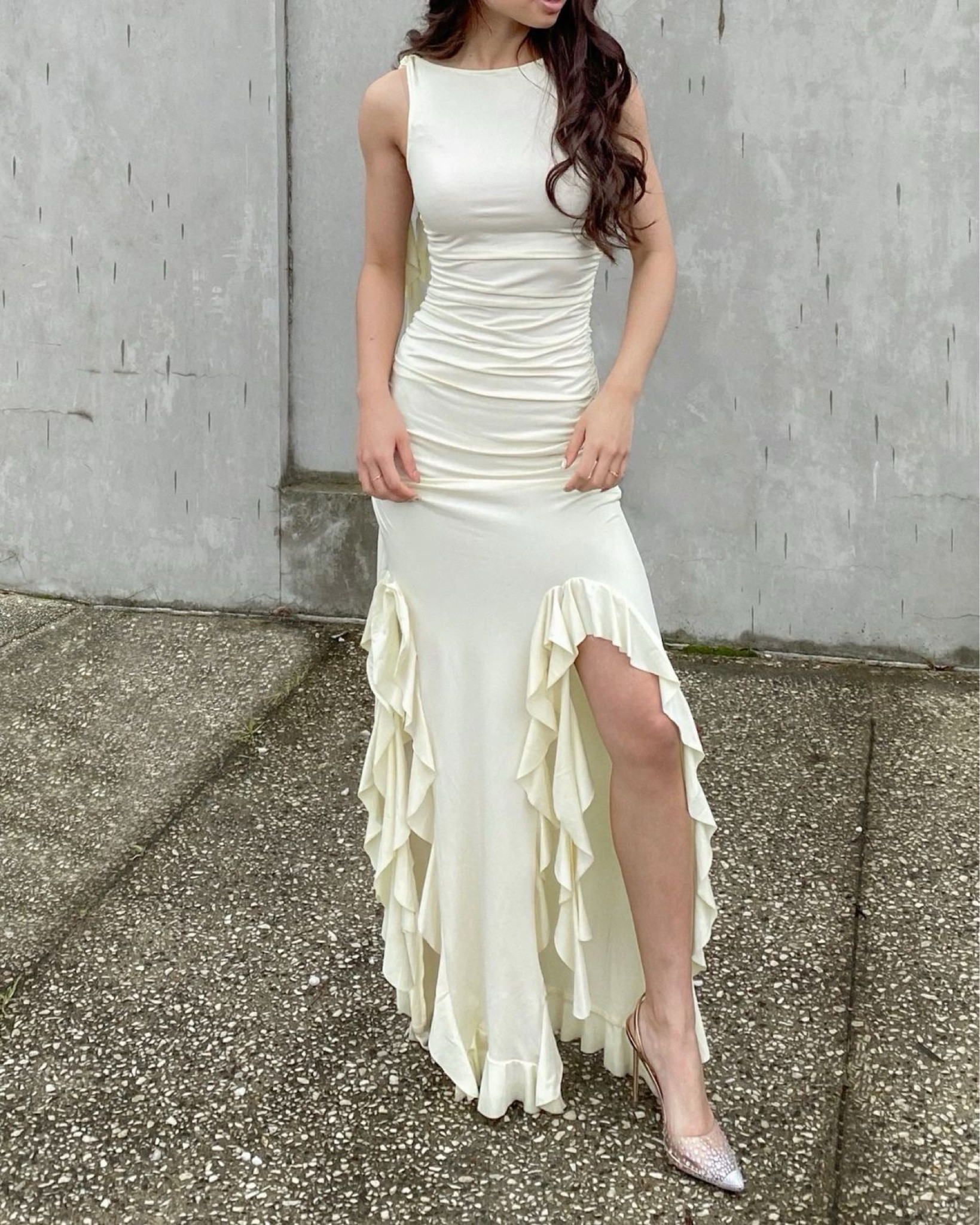 Embrace elegance with a touch of flair! This stunning ivory dress with cascading ruffles and a chic side slit is perfect for making a statement. 💫 #FashionForward #ElegantStyle #ChicOutfit

#LTKTravel #LTKStyleTip #LTKSeasonal