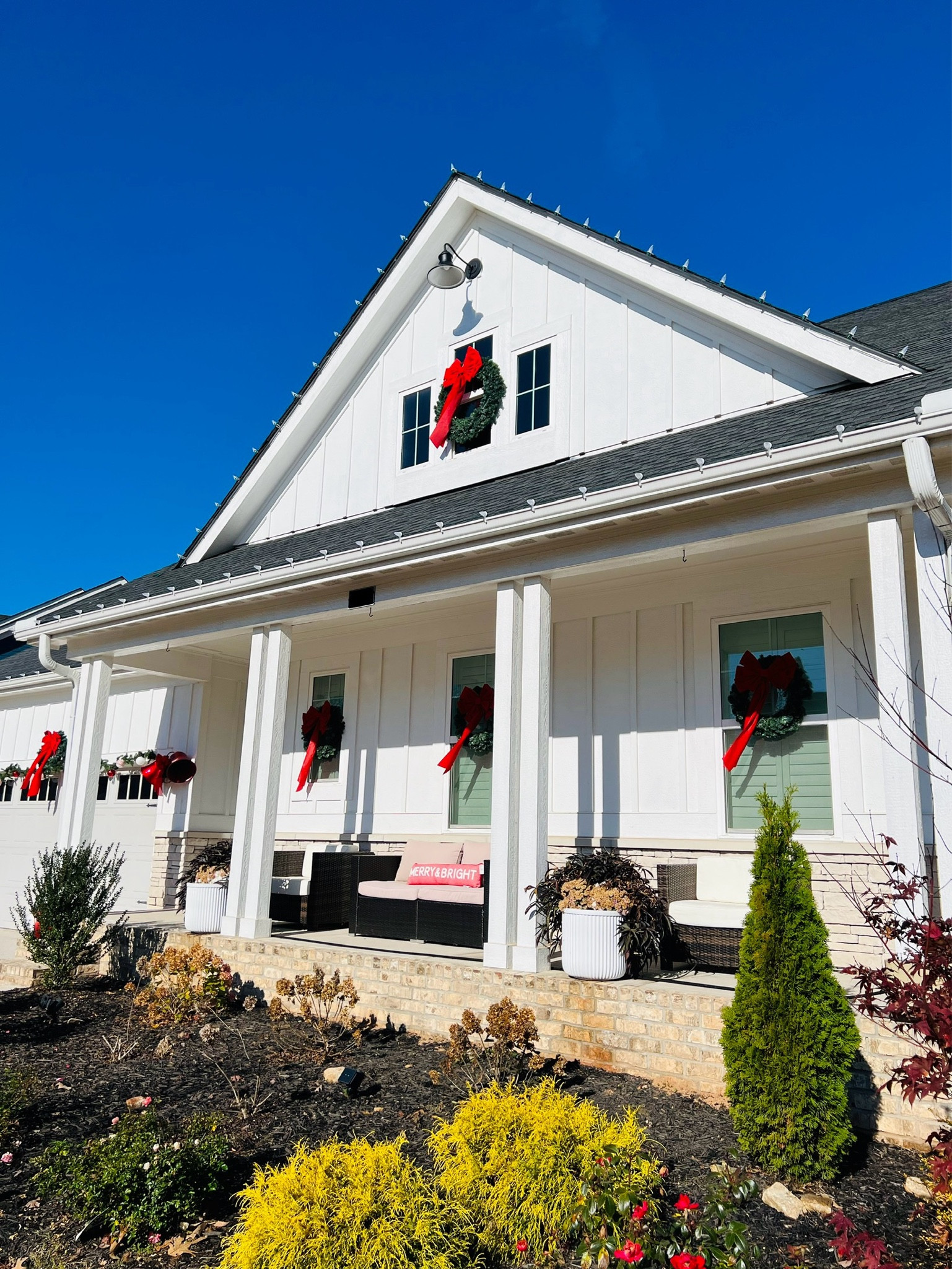 Southern Traditional Christmas Exterior Front Porch. Classic Red, White and Green for the holidays. 

#LTKHoliday 

#LTKhome #LTKSeasonal