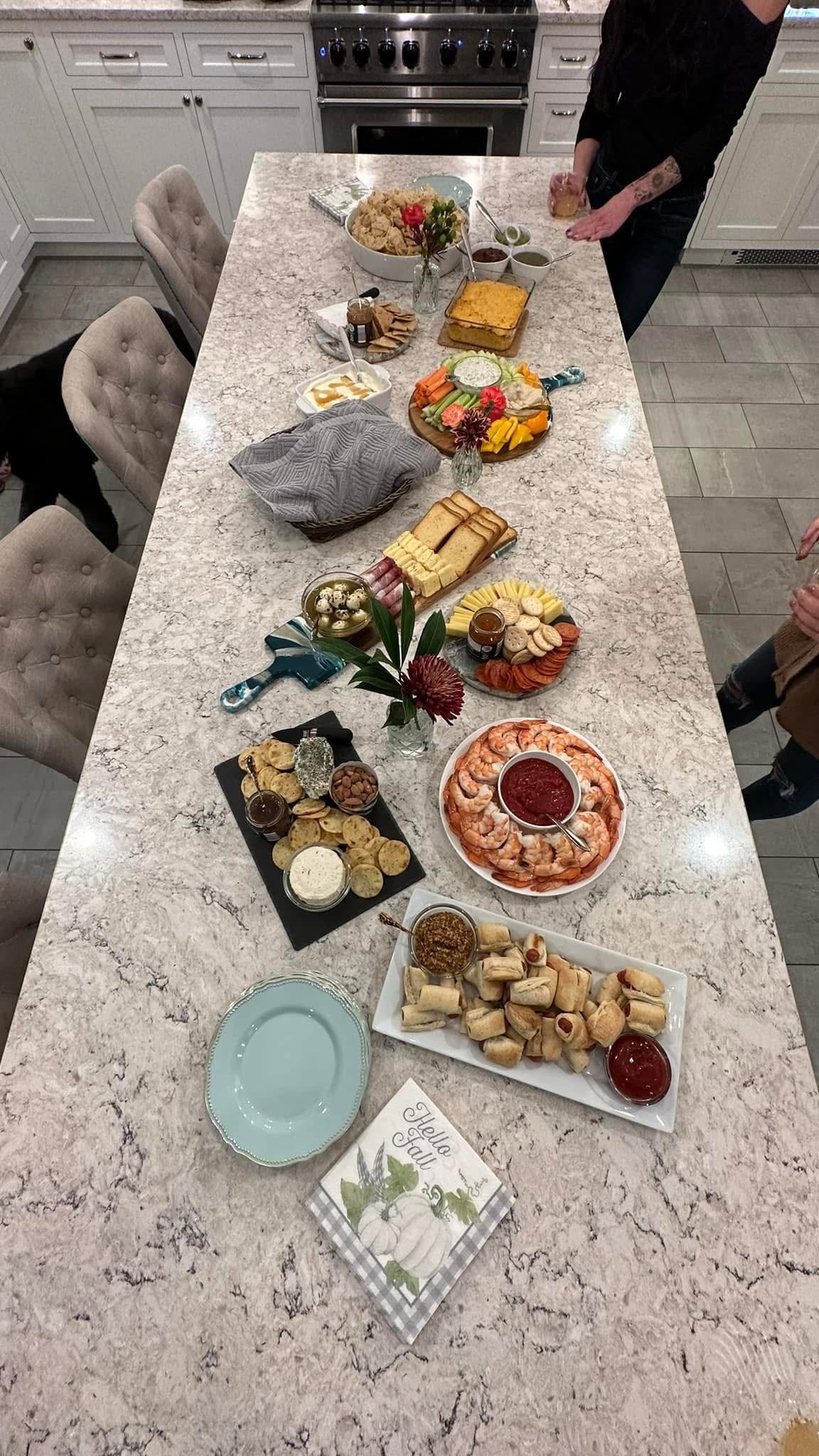 Friendsgiving appetizer table. Lots of charcuterie boards and various appetizers on serving trays

#LTKHome #LTKSeasonal #LTKParties
