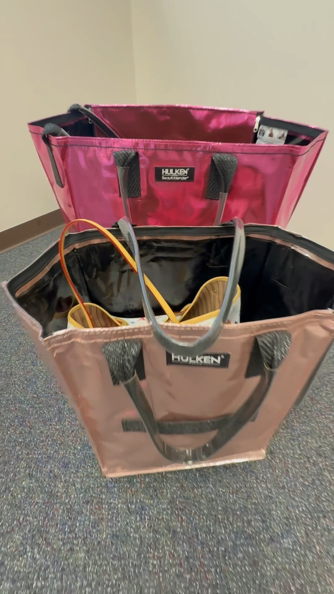 I love using my large pink Hulken for travel!!!! I wanted to show the difference in size between a large and medium. My pink is the large and the rose gold is a medium. The newer styles have a cover that you can zip close! It lays flat out of the way when you’re not using it! 

I’m ordering a green medium Hulken to use on a daily basis for work. I love all of the colors. The best part is they fold flat🥰🥰

#LTKItBag #LTKOver40 #LTKTravel