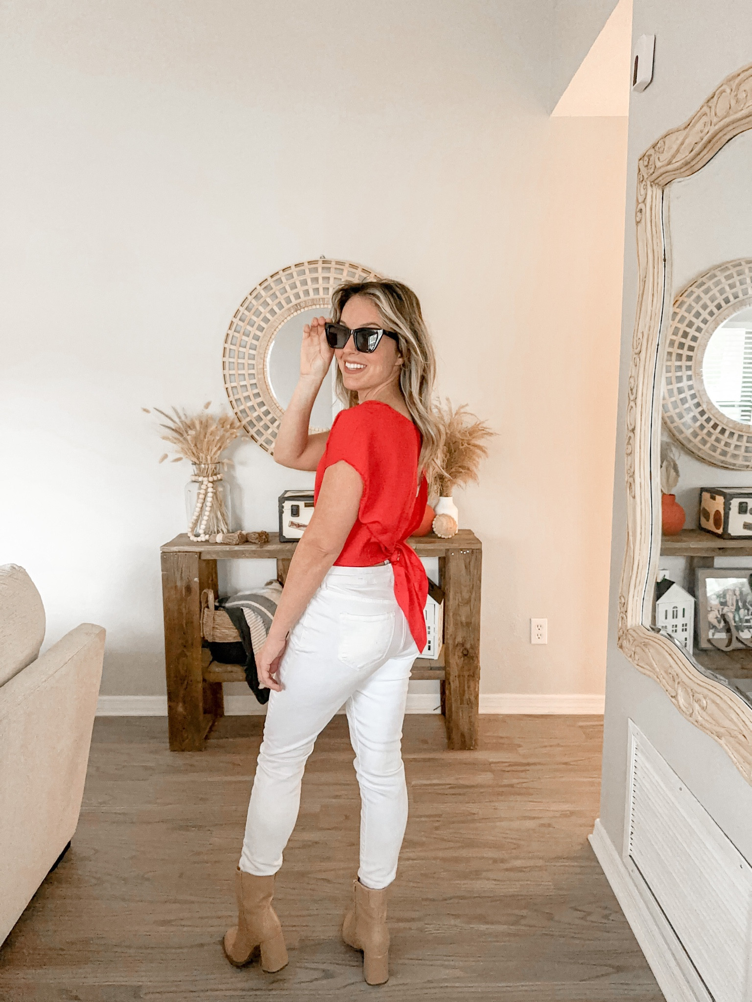 Valentine’s Day outfit 
Red slit with tie top 
White pants
Tan boots
Black sunglasses 

#LTKstyletip #LTKshoecrush #LTKSeasonal
