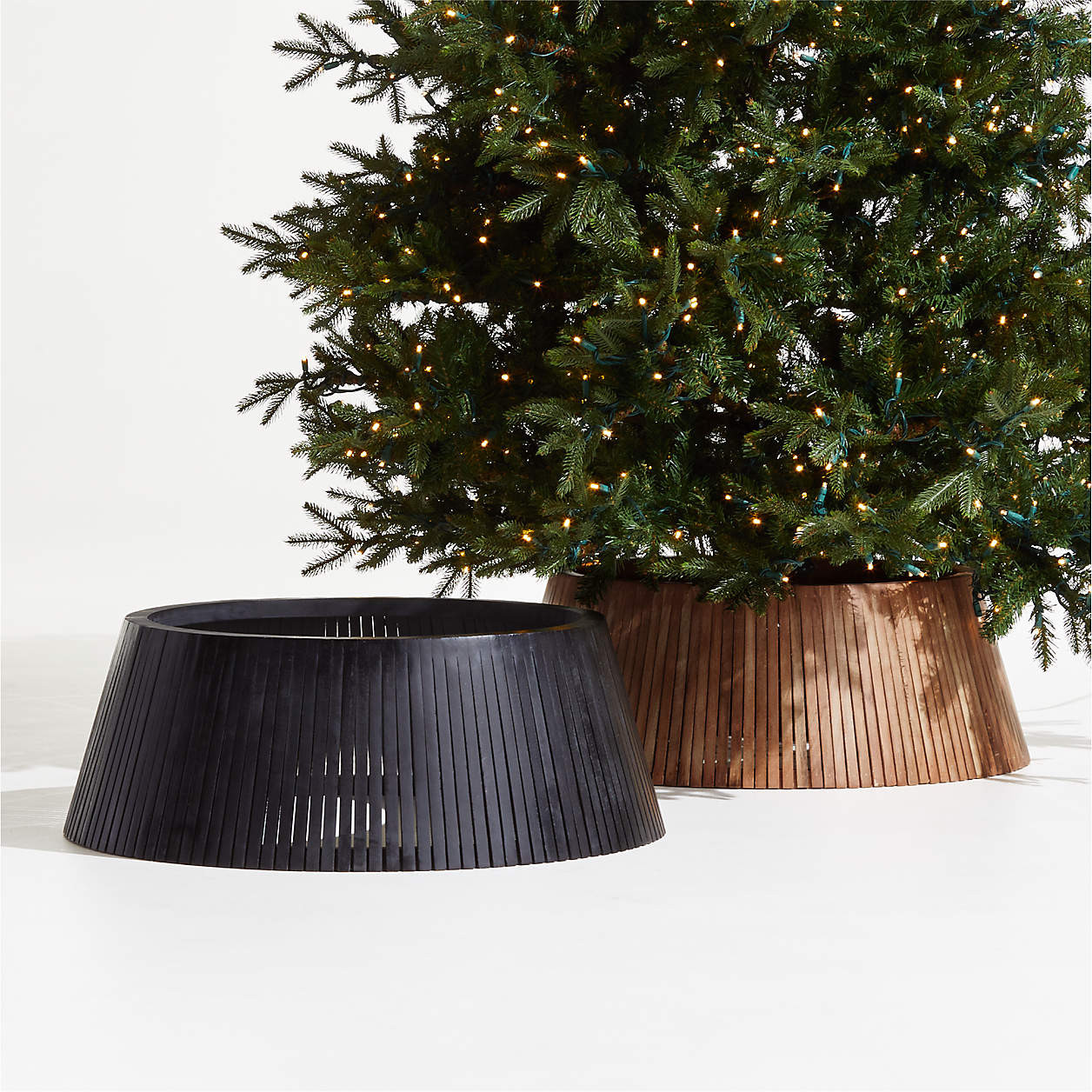 Skei Wood Natural Christmas Tree Collar | Crate and Barrel | Crate & Barrel