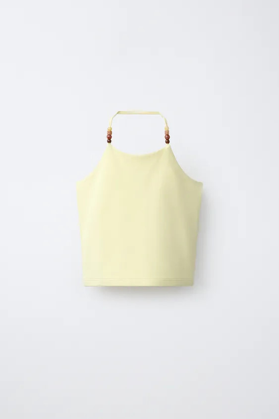 Sleeveless halter neck top with beaded detailing on the neckline. | Zara UK