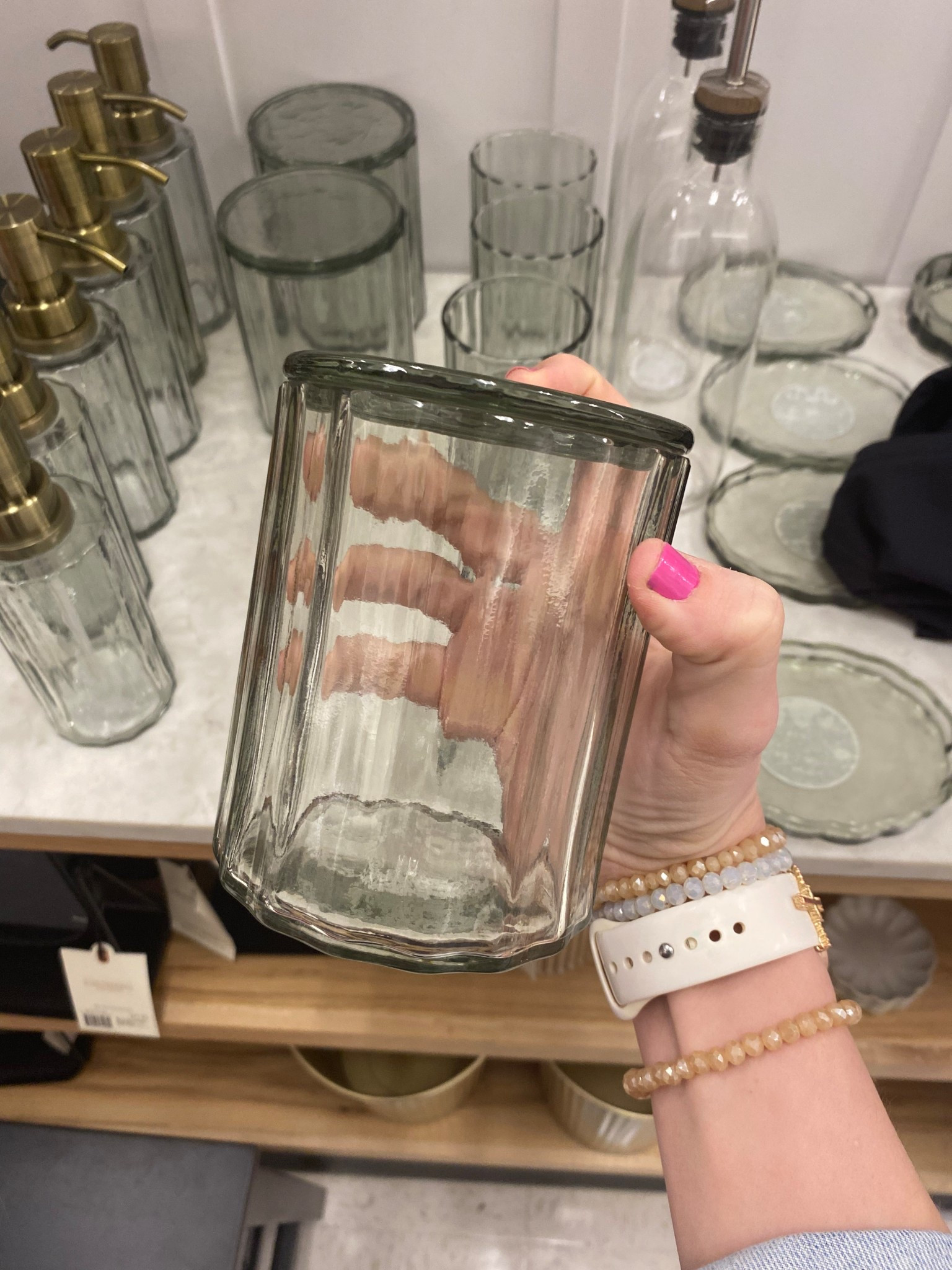 Obsessed with the style and quality of this glass canister with a lid from Target! The green glass hue gives me a vintage vibe I’m soo in love with! 

#LTKBeauty #LTKHome #LTKFindsUnder50