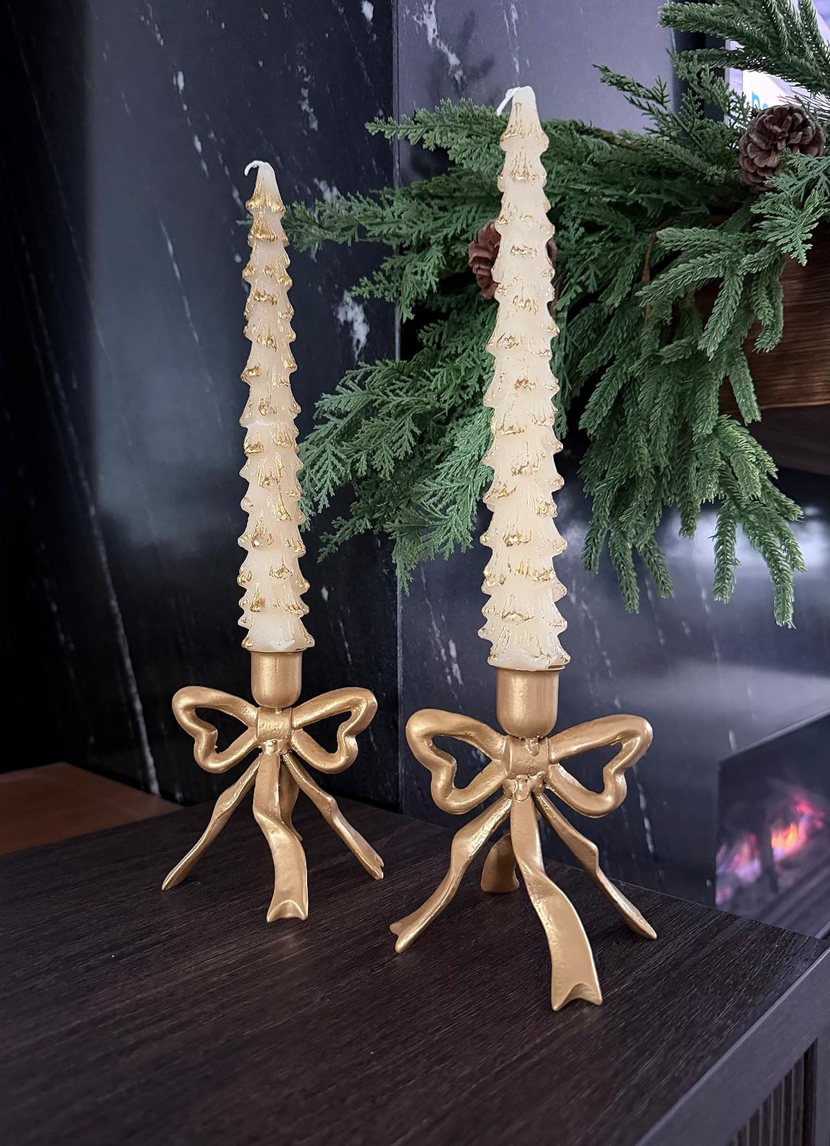 The cutest holiday combo! Golden bow taper candle holders. Tree candles. Perfect for Christmas. #holidaydecor | Amazon (US)