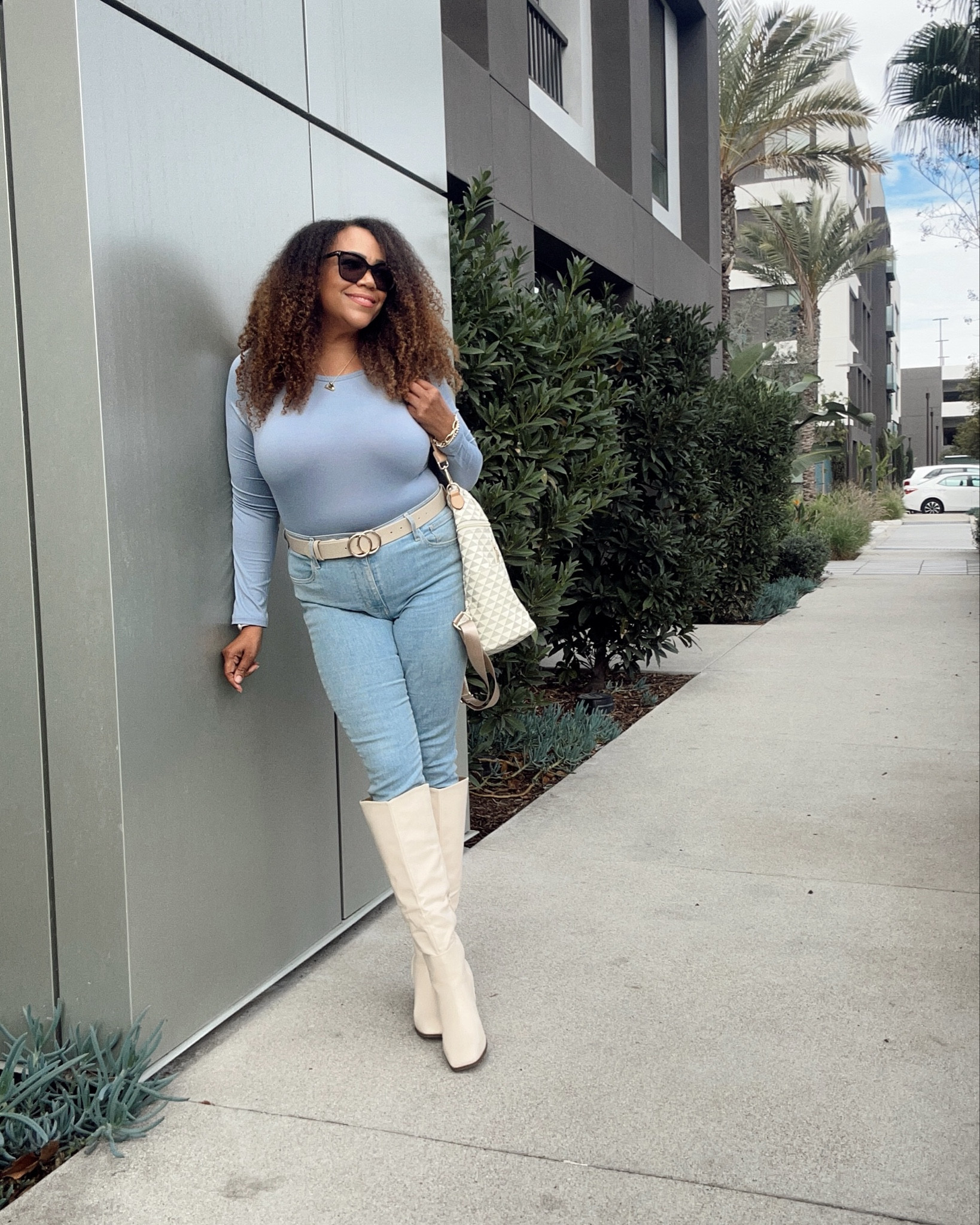 Don’t you love when you try to wear something you wouldn’t have worn before and it works?! 💁🏾‍♀️ Before, I would’ve never worn lighter wash jeans with boots in this color like this - because I’m midsize and 48. Not slimming and low key enough. Nonsense. #wearwhatyoulove 

#LTKMidsize #LTKOver40 #LTKFindsUnder100