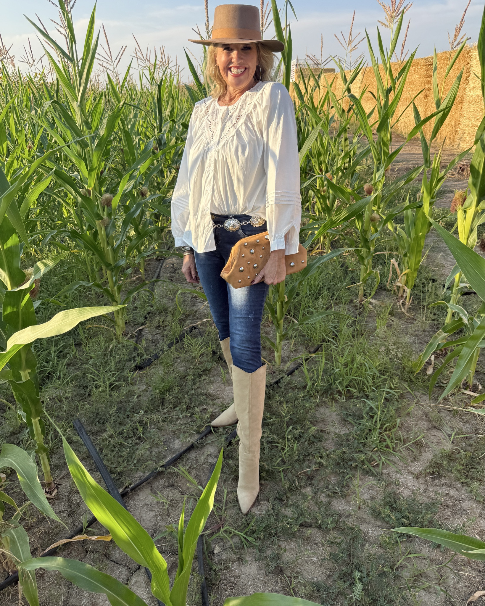 Fall Outfit inspiration 🍂

With a little touch of western✔️

Can you believe this is an Amazon find top? White button up with little bit of lace/eyelet detail, and slightly puffed sleeve. 
$19.99

Med wash skinny jeans by Spanx , fits tts I am in med and there on sale save extra 10% by stacking my code: Deardarcyxspanx 
Silver western belt (mines vintage) I linked similar

Suede and grommet clutch from Target 

Tall suede pointed toe boots by dolce vita  tts mine are from last season linked this seasons similar

Hat is lack of color 

Silver hoops Jenny bird 

#LTKFindsUnder50 #LTKSaleAlert #LTKFallSale