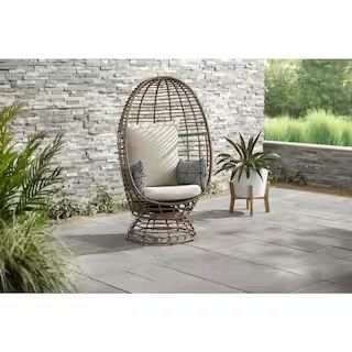 Brown Wicker Outdoor Swivel Patio Egg Lounge Chair with Beige Cushions and Black/Cream Pattern Pi... | The Home Depot