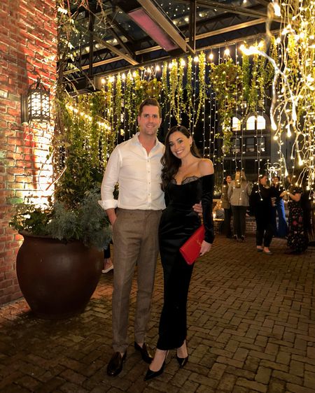 Kat Jamieson wears a black velvet dress to a cocktail party. Black pumps, heels, cocktail party, men’s, menswear, red clutch, formal, wedding guest dress. 

Dress runs very small - I went up 2 sizes and it was still fitted! 

#LTKSeasonal #LTKwedding #LTKHoliday