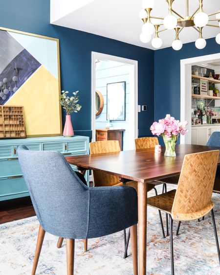 Here’s a little throwback to our dining room in our last house! You might recognize the dresser in this space because it now lives in my coffee nook! Such a great piece! #diningroom #colorfuldecor #diningroomtable #diningroomchairs #colorfulwalls #lightfixture #chandelier #eclecticdecor 

#LTKhome