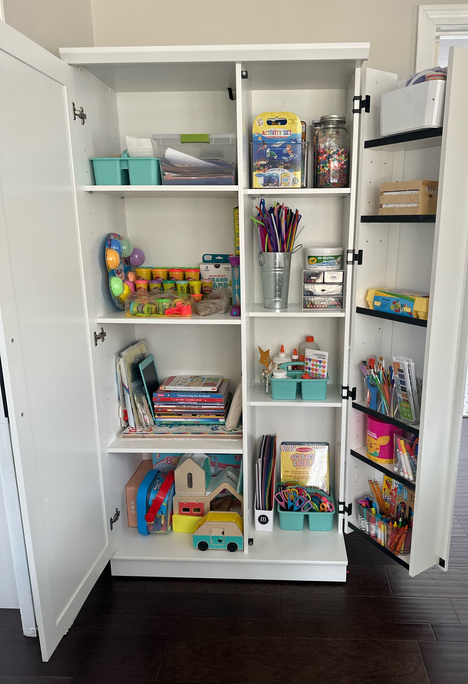 Craft closet for toddlers

I throw all the messy items and craft supplies in here along with some special toys. This cabinet is locked up so my kids can’t get into it without me. 

#LTKhome #LTKfamily #LTKkids
