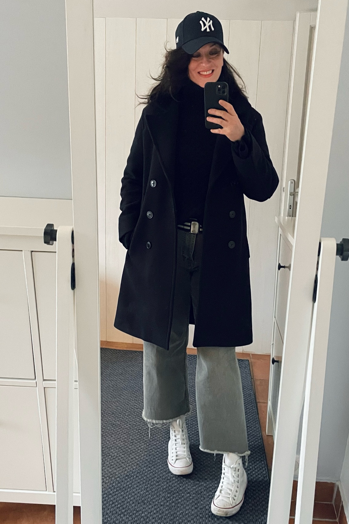 Navy baseball cap #newera / Navy peacoat #pablo / Navy wool turtleneck #arket / Coral matte lipstick #guccibeauty / Striped canvas belt #hm / Khaki barrel jeans #kiabi / White leather Chuck Taylor high tops #converse 

#LTKover40 #LTKeurope #LTKmidsize