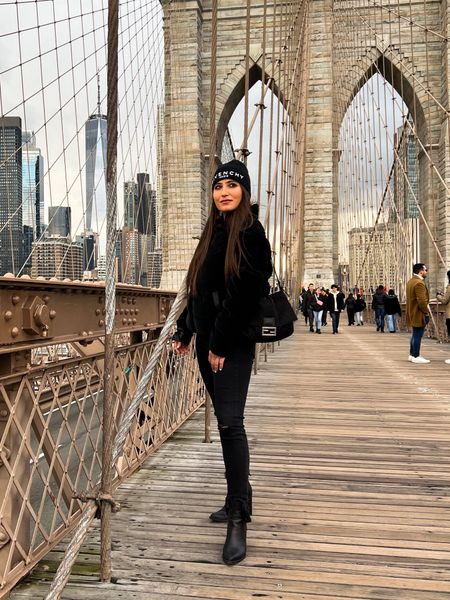 All black outfits for a casual winter vacation look. I love how adding some high end luxury pieces to regular basic pieces. 

#LTKSeasonal #LTKstyletip #LTKtravel