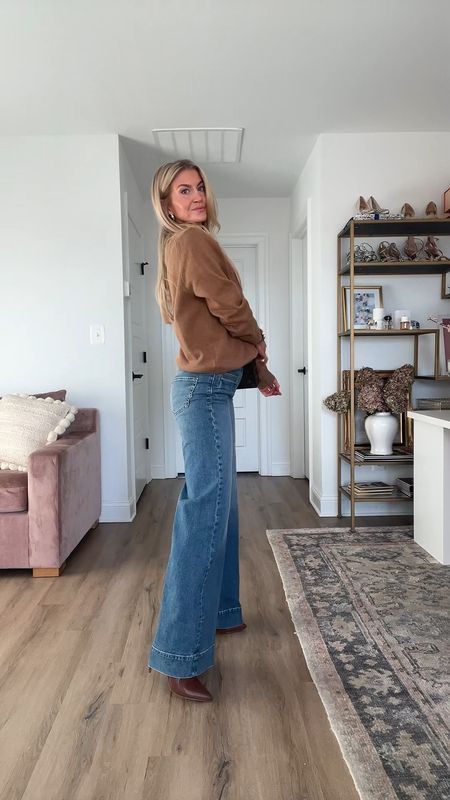 I found fully stocked high rise wide leg denim similar to my other pair that sold out so fast! These are on sale for $80 off and they are fabulous. 
Jeans: run tts
Sweater: wearing a men’s med
Boots: tts 

#LTKstyletip #LTKsalealert #LTKSeasonal