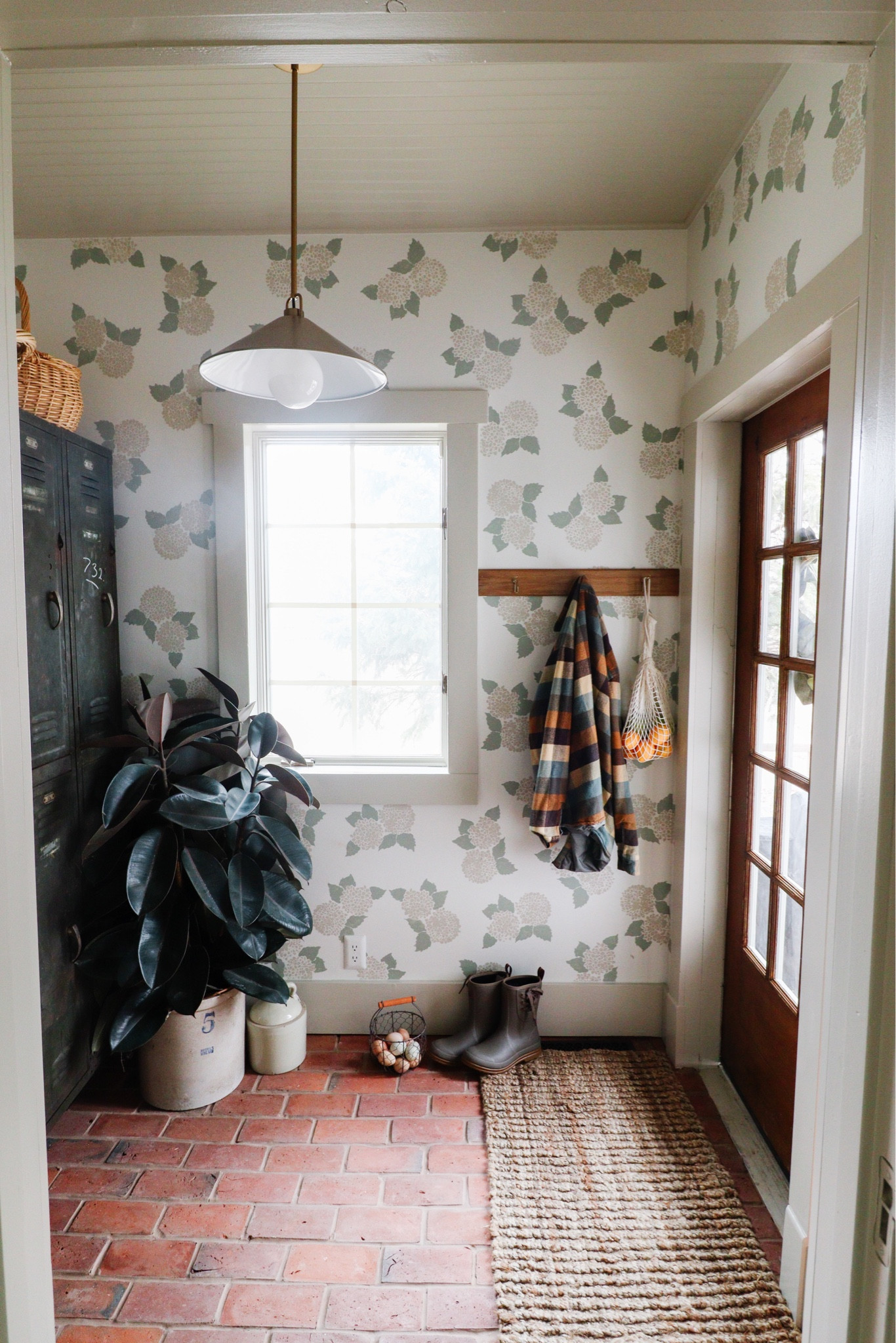One of the first rooms I was able to complete in our house. We got amazing vintage lockers for $50, and amazing old back door that let ya in so much light, and I hand stenciled the wallpaper  

#LTKFind #LTKfamily #LTKhome