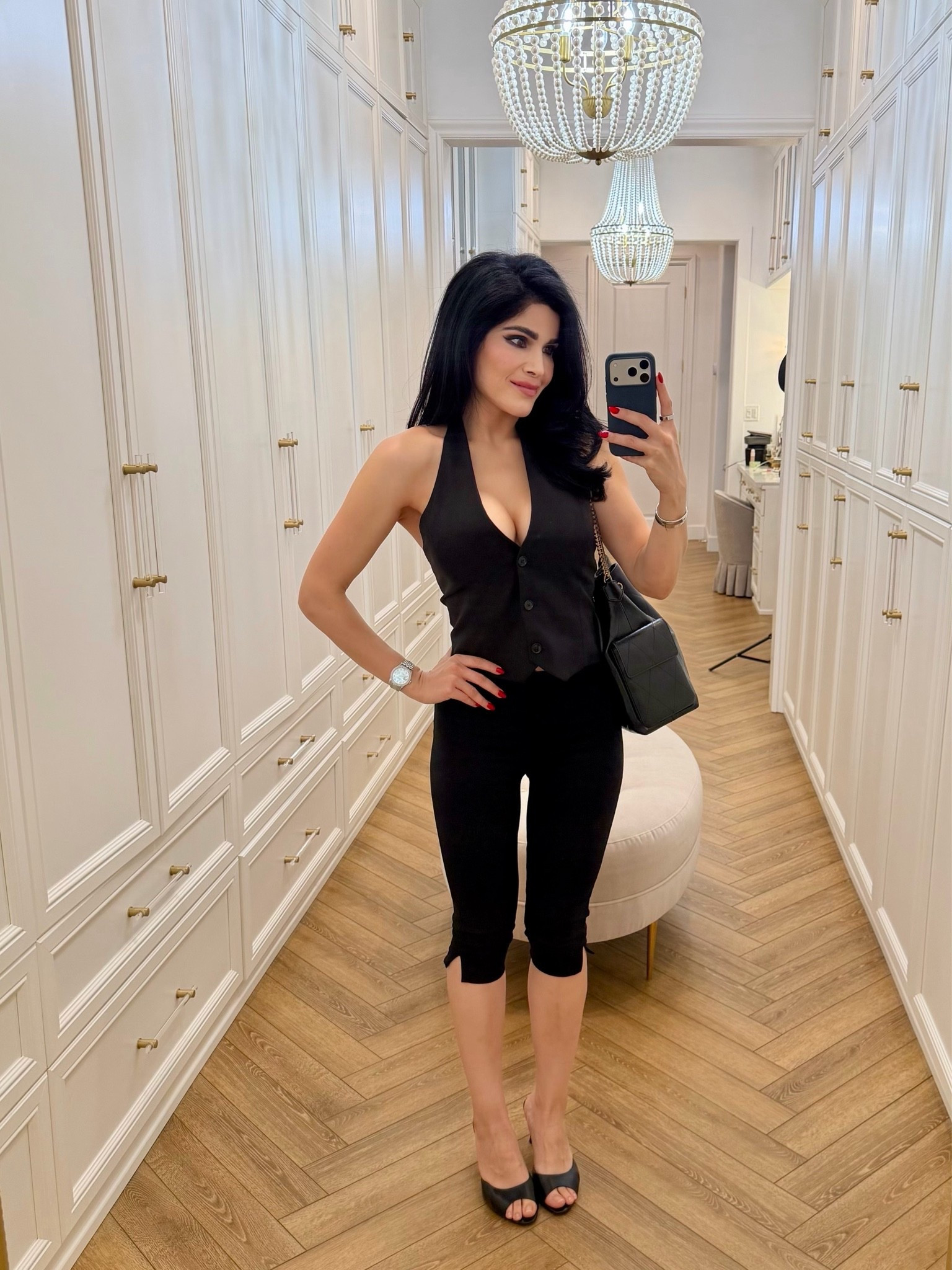 Love an all black outfit 
Capris
Heels
Black mule heels
Black vest

#LTKootd #LTKgrwm #LTKdayinmylife
