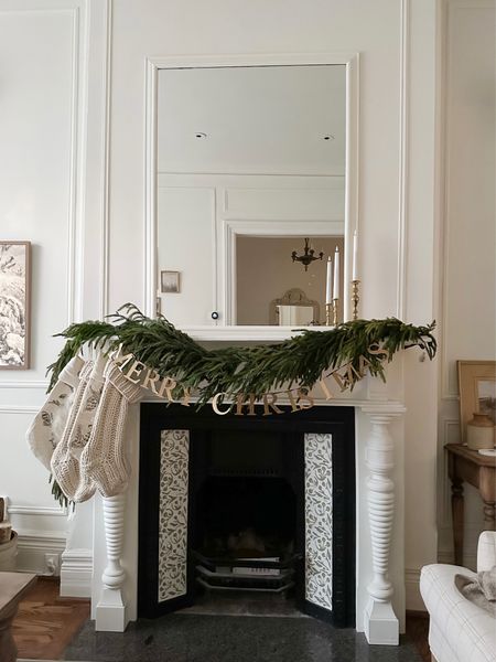 Shop my Christmas mantel decor. Garland, brass letter sign, stockings. Garland is on sale right now but will sell out quickly 

#LTKHoliday #LTKsalealert #LTKhome