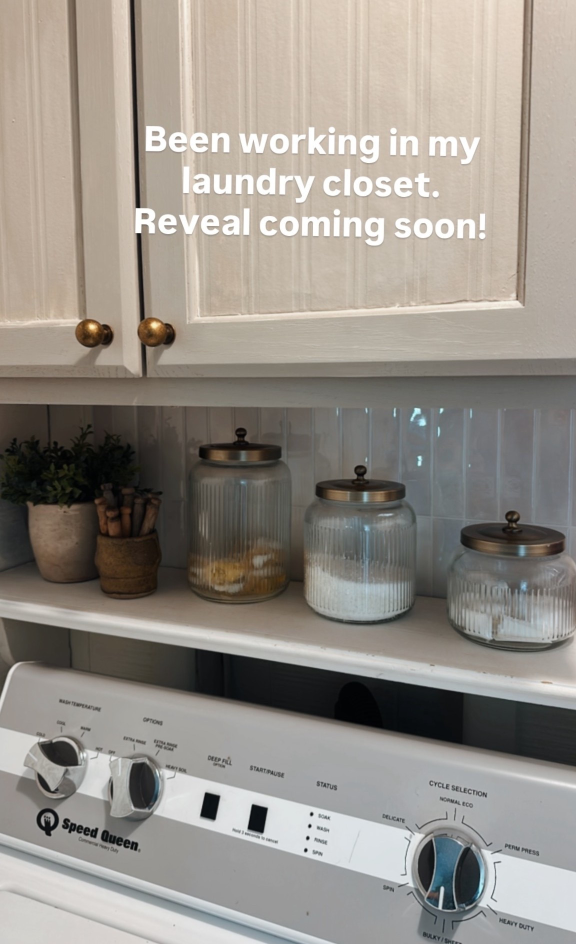 Laundry closet update: stock cabinets from Lowe’s, added beadboard wallpaper to the fronts, knobs, and paint. SW perfect greige. Tiles from Amazon. (Peel and stick for life!) canisters from Target. 

#LTKHome #LTKStyleTip