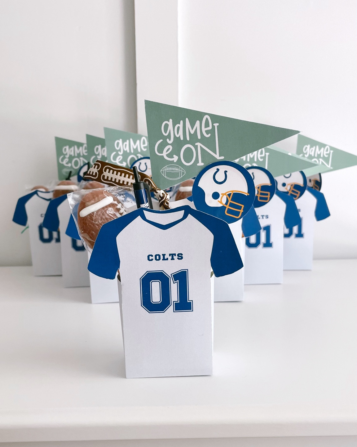 Football team gifts paired with The Letter Vee Printables 

#LTKkids #LTKSeasonal #LTKfamily