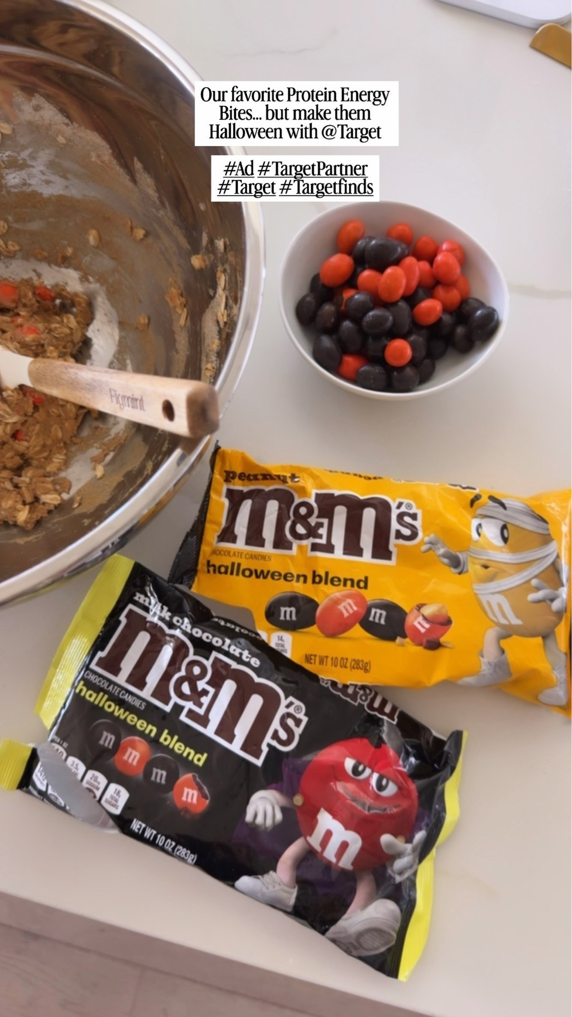 #Ad #TargetPartner A little Halloween magic 🎃🍫✨ Partnering with @target to make these Halloween M&M’s Protein Energy Bites—the easiest festive snack and a guaranteed favorite around here. 👻 Easy to make, even easier to eat 🤍 Save this one for spooky season! #Target #Targetfinds #MMSPartner @Shop.LTK #liketkit
🎃 Halloween M&M’s Protein Energy Bites
Ingredients

1 cup old-fashioned oats
½ cup creamy peanut butter
⅓ cup honey or maple syrup
½ cup vanilla protein powder
1 tsp vanilla
½ tsp cinnamon
Pinch of salt
⅓–½ cup Halloween M&M’s