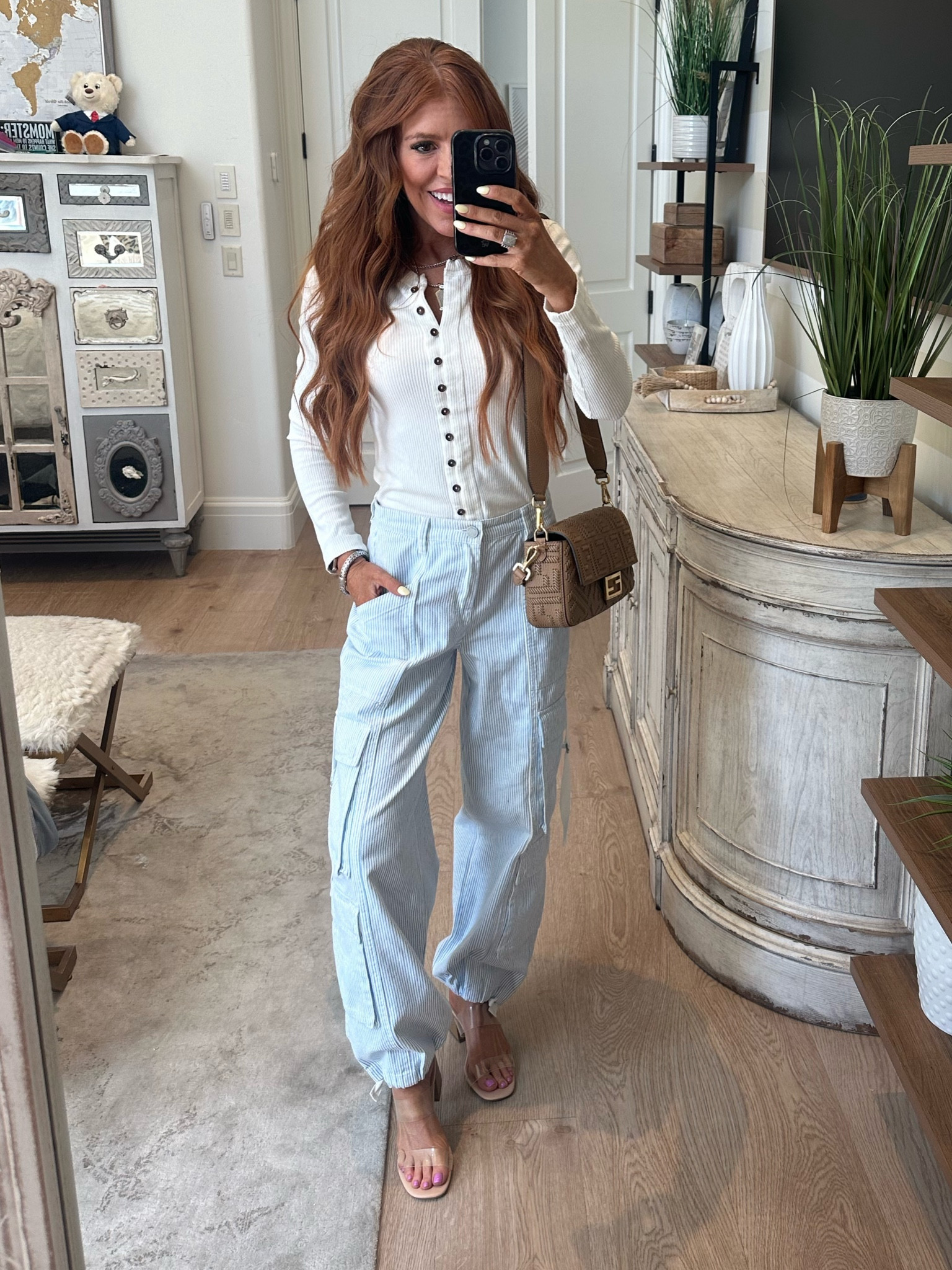 OBSESSING over these pinstripe pants (that are $100 off) and my favorite Amazon top! 
Shirt: Small 
Pants: 24 (RUN big so size down) 

#LTKSeasonal #LTKBeauty #LTKOver40