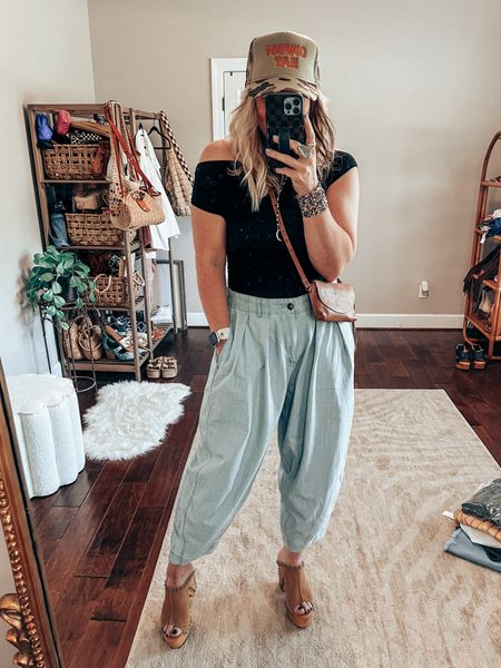Date Night Look 🖤✨
✨Top M
✨Pants (can’t link here)
✨Sandals TTS 
✨HAT (can’t link here) 
Date night look, black top, Amazon fashion, dingo sandals, summer outfit, spring outfit 

#LTKFindsUnder50 #LTKStyleTip #LTKOver40