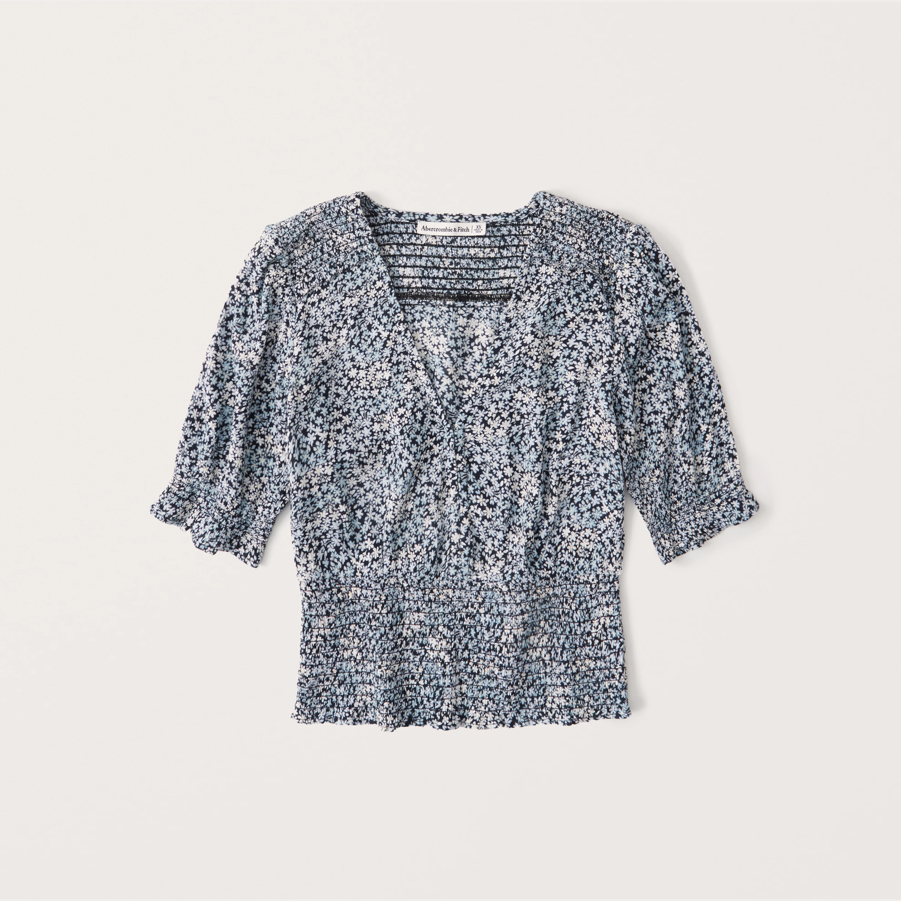 Short-Sleeve Smocked Blouse
					



		
	



	
		Exchange Color / Size
	


	

	

	
		


  $49
  	... | Abercrombie & Fitch (US)