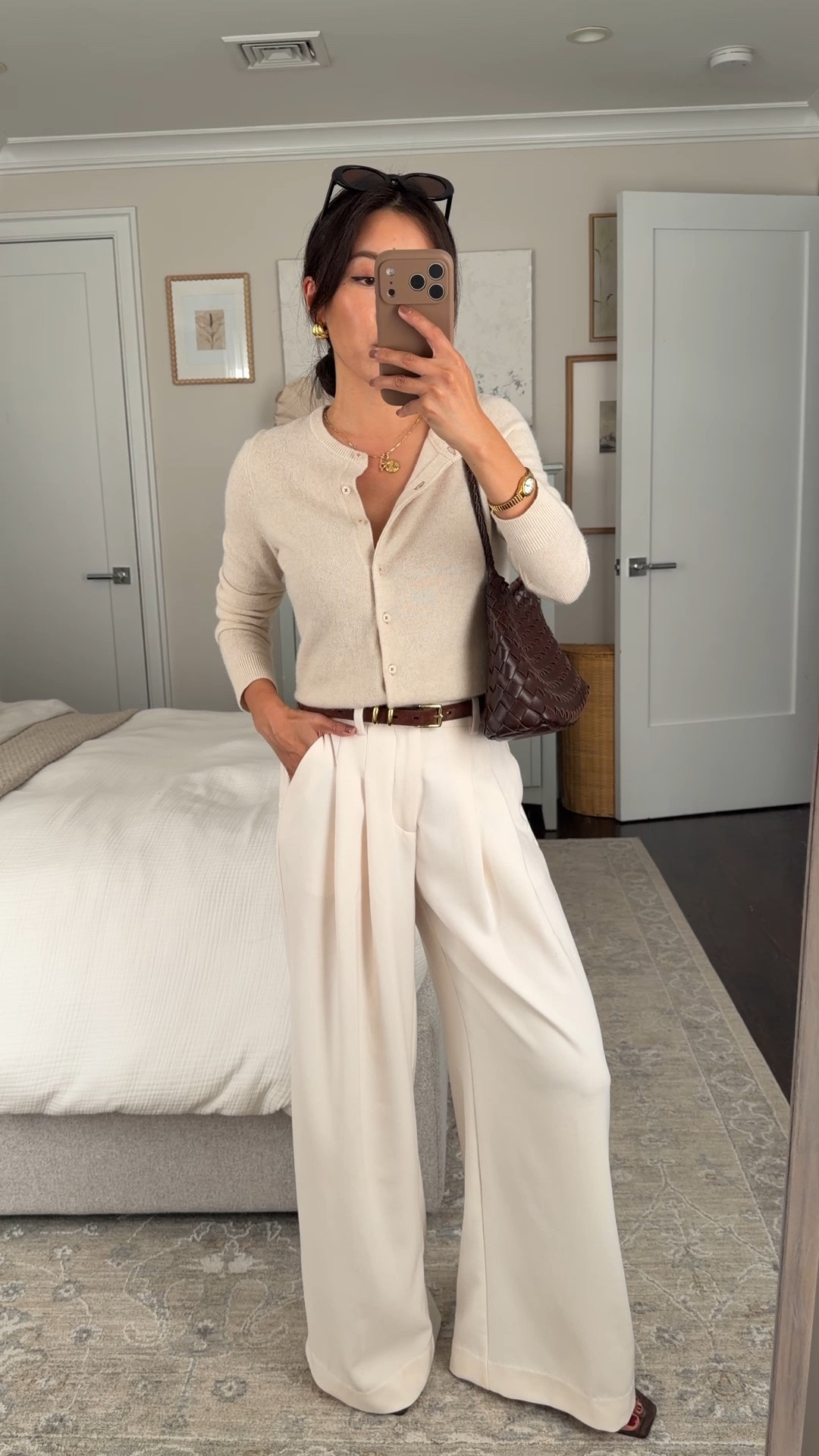 Size info below! 
• Avery Wide leg pleated trouser pants XXS regular hemmed, now they have some in petite! White Dalia color and also comes in navy pinstripe. 

Pants are soo soft and comfy with slightly stretch back it was worth it for me to hem, love the wider flowy cut that can be worn from work to evening style 

• Juliet cashmere cardigan sweater XXS regular is petite friendly, color is Pearl. slimmer in fit and length is a bit shorter 
• Tony Bianco sandal heels 5.5 
• Anthropologie calls Woven bag 

petite friendly, winter white , office style, fall workwear outfit

 #LTKSeasonal #LTKPetite #LTKWorkwear