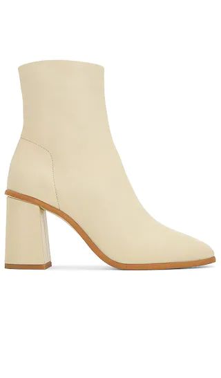 Sienna Ankle Boot in Buttercream | Revolve Clothing (Global)
