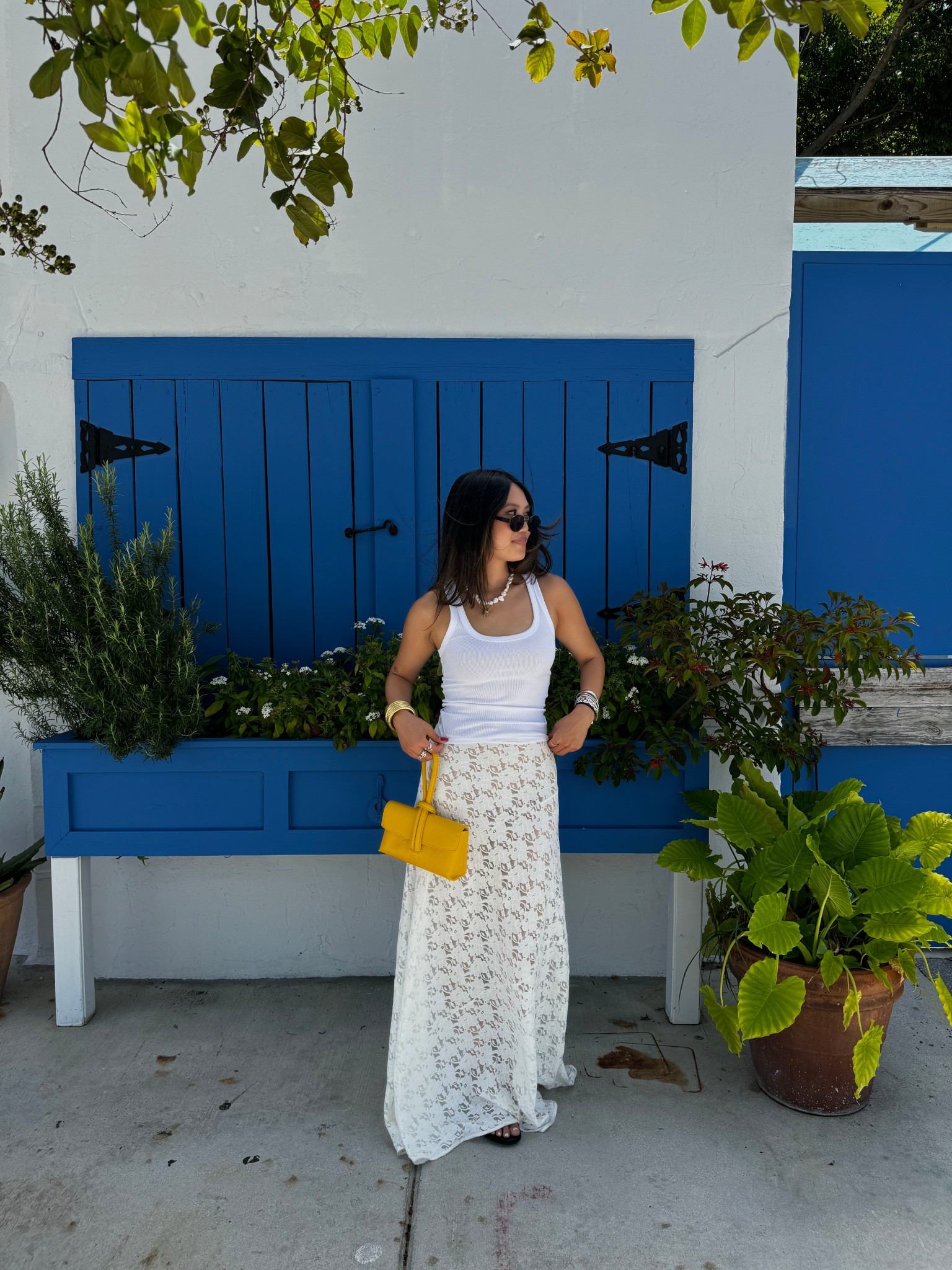 tank is zara & bag is from a random boutique in italian but linked similar! wearing US 6 in skirt but def could’ve sized down to a 4 