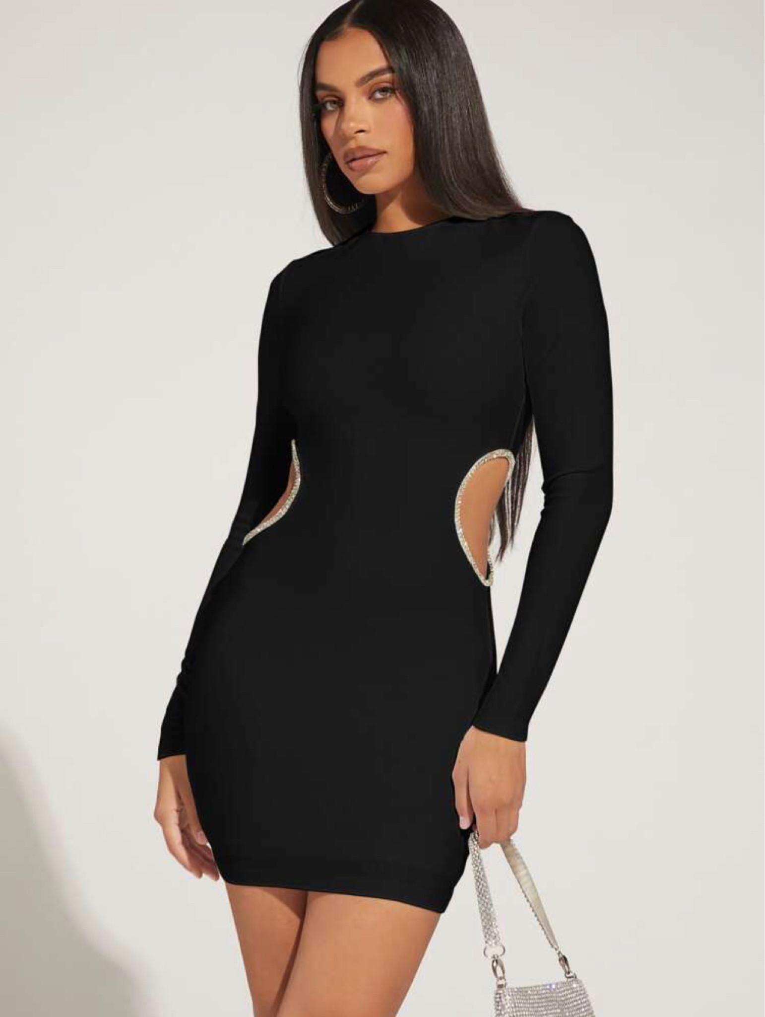 Party dress for NYE
A black dress with cut out rhinestones details at the waist. This dress is also available in Kelly green. 
Size XS is sold out.

#LTKunder50 #LTKSeasonal #LTKHoliday