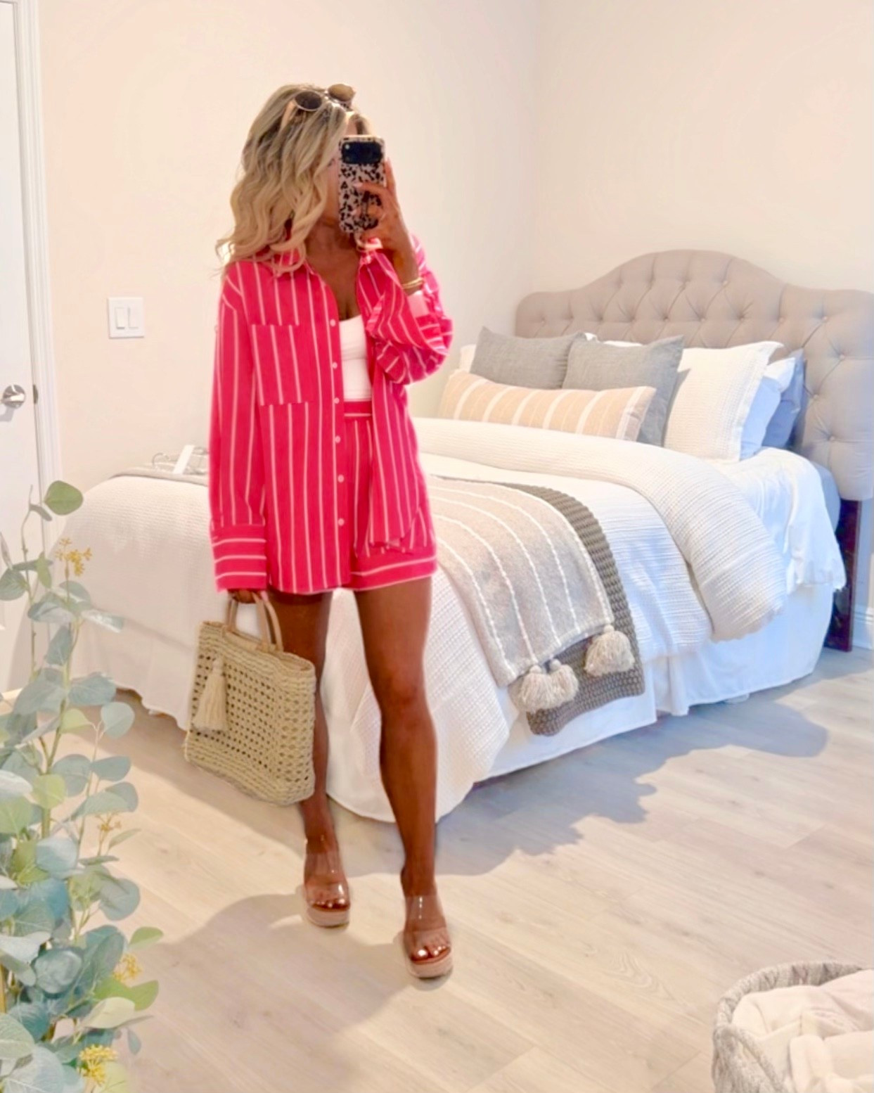 Hot pink matching shorts set styled as a casual vacation outfit or resortwear outfit! This two piece set could be styled as an easy, affordable everyday outfit for spring or summer. It could also be worn as a swim coverup. 

Matching set, pink set, vacation set, resort set, resort outfit, beach outfit, beach coverup, coord set, straw bag, wedges 

#LTKSwim #LTKootd #LTKTravel