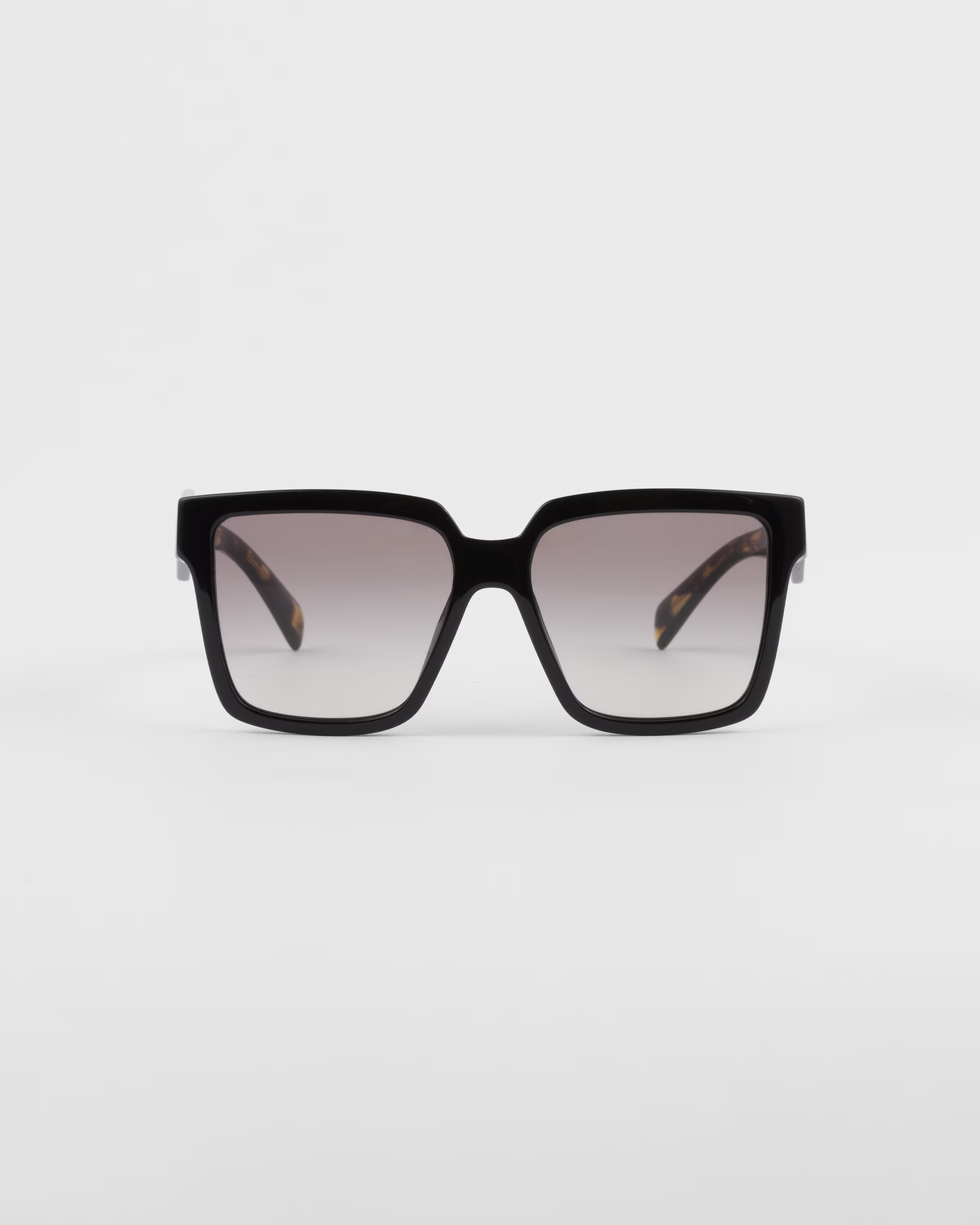 Sunglasses with Prada logo | Prada US