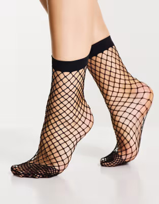 ASOS DESIGN calf length fishnet socks in black | ASOS | ASOS (Global)