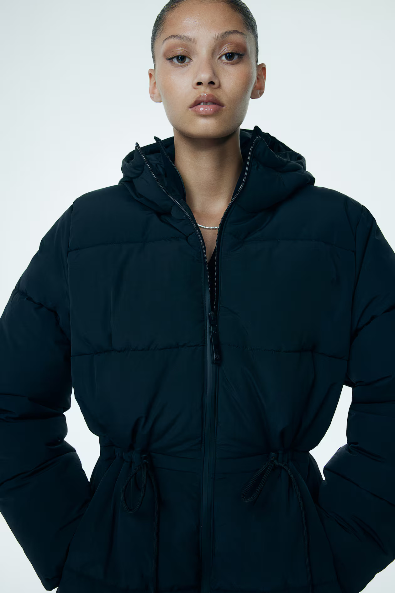 Oversized drawstring-waist puffer jacket | H&M (UK, MY, IN, SG, PH, TW, HK)