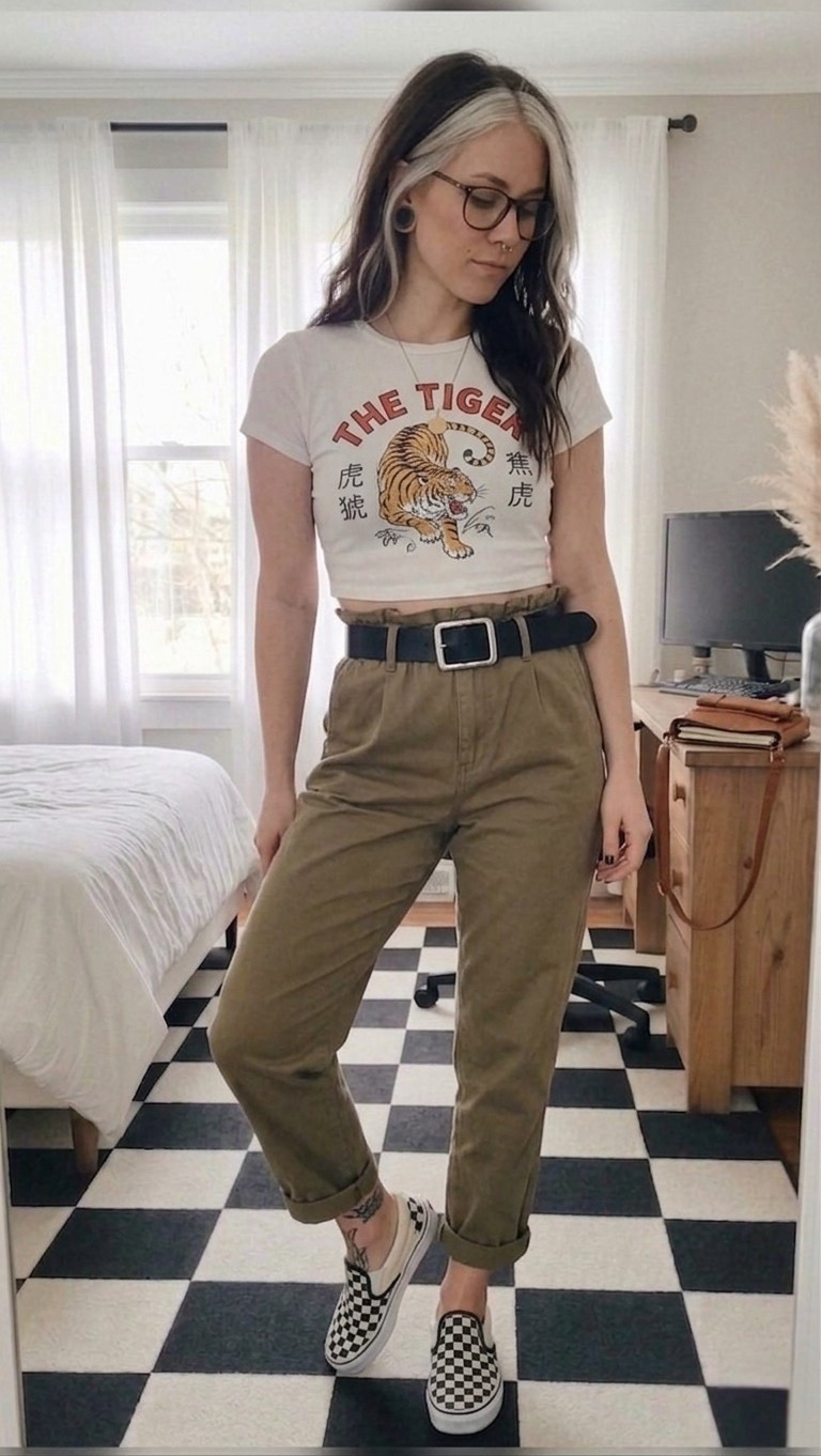 Switching up the grunge for something a bit more polished but still totally edgy. This vintage-inspired Tiger Baby Tee is a total mood, especially paired with these olive paperbag chinos that are as comfy as they are flattering.

I’m obsessed with the mix of textures here—the wide leather belt cinches the waist perfectly, and you can never go wrong with classic checkered Vans to keep it grounded. This is my new go-to for coffee runs and casual hangouts.

#LTKMidsize #LTKSeasonal #LTKootd