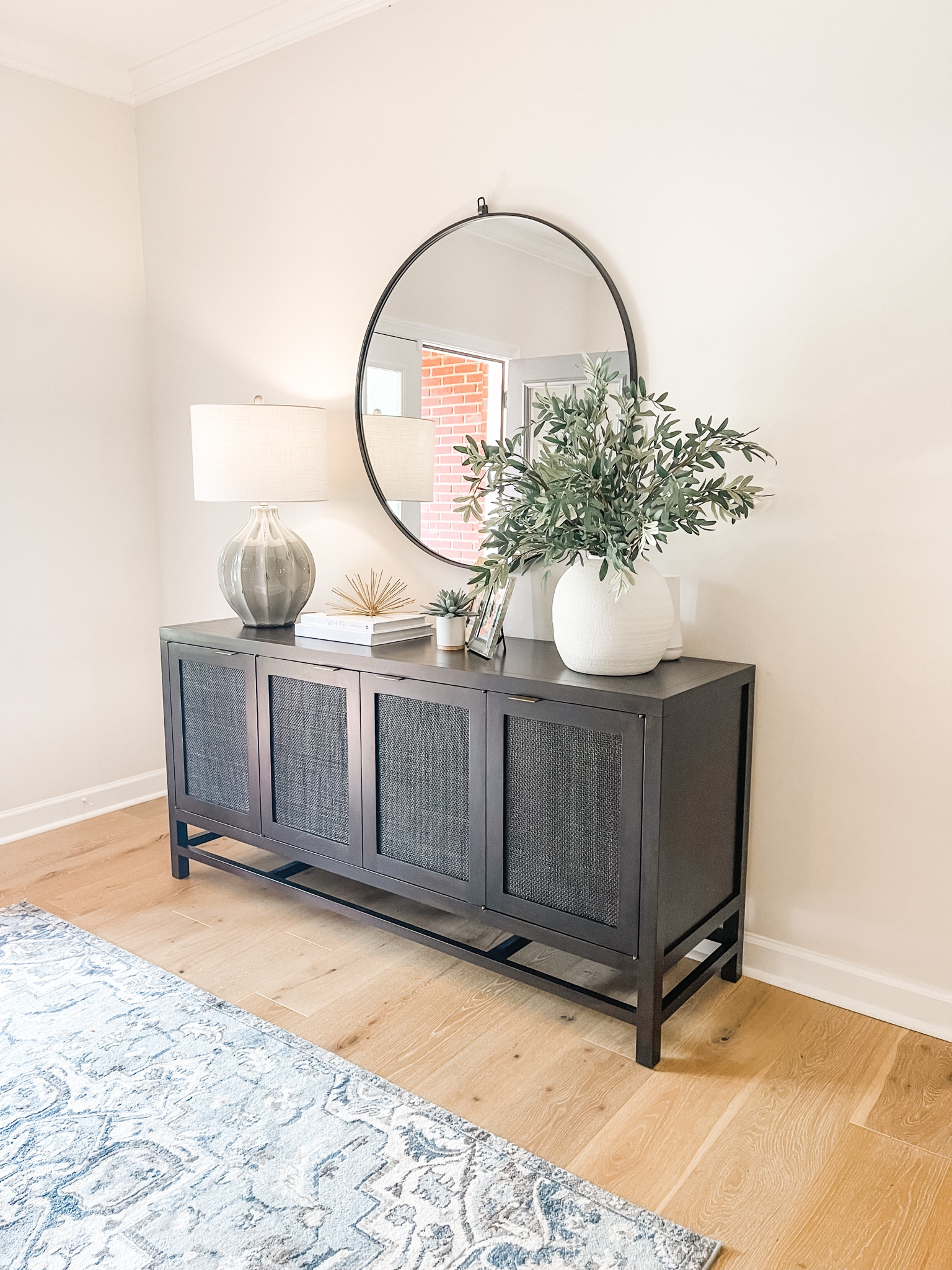 We posted this entryway at the end of 2021 and it took off like wildfire over on Pinterest. It’s definitely been our most popular social media post of 2022. It completely blows our mind that over 2.1 MILLION people have seen our little entryway, 91k opened our link and 12k people saved our pin. Social media is wild, isn’t it?!? We’re so thankful you’re here! 🥰

#LTKFind #LTKSeasonal