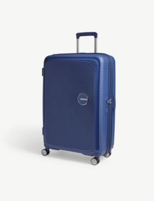 Soundbox expandable four-wheel suitcase 77cm | Selfridges