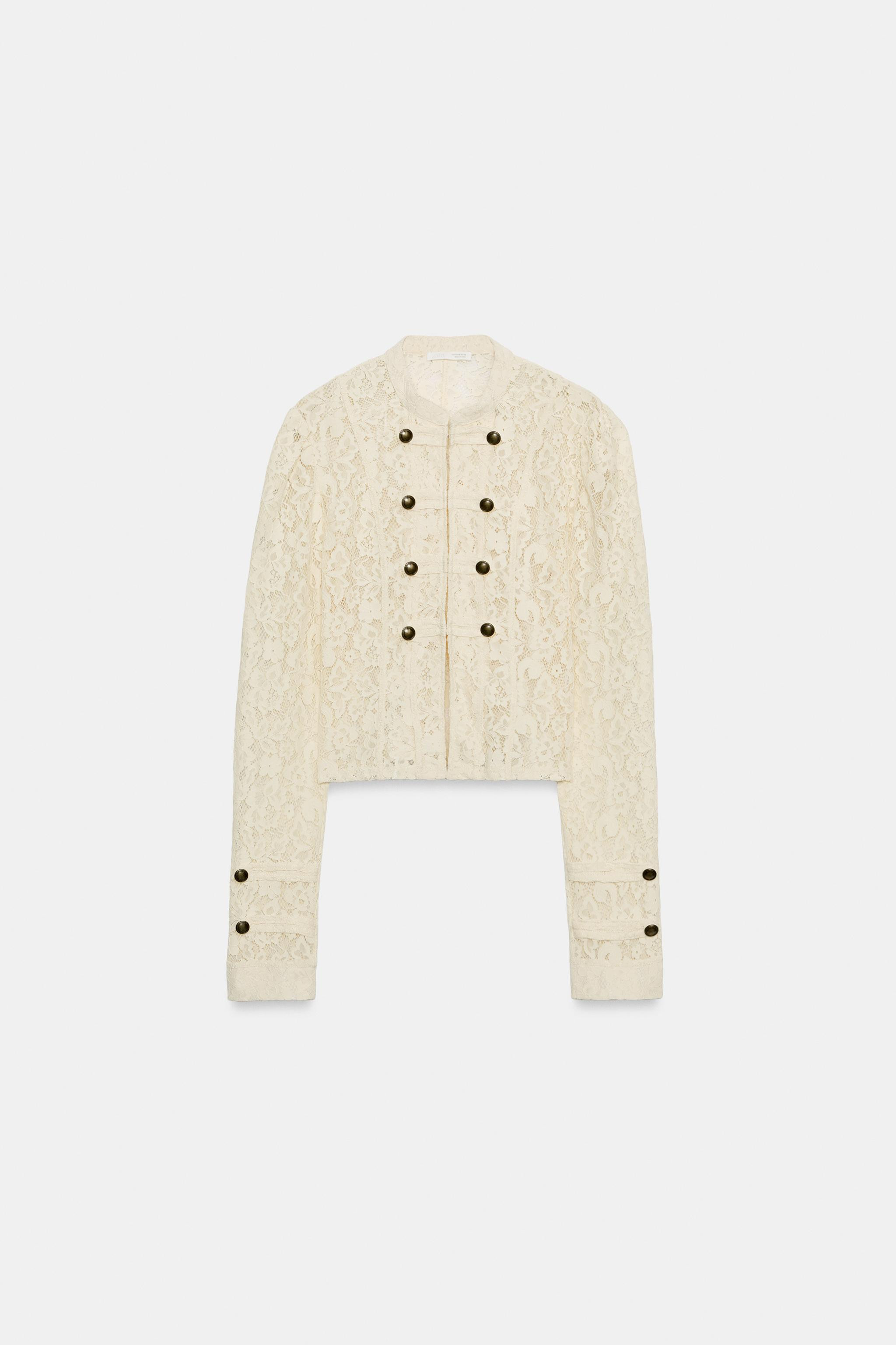 Jacket made with polyamide yarn. Stand collar and long sleeves. Front fastening with metal hooks. | Zara US
