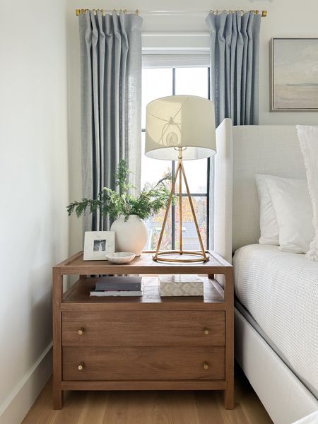 Blue gray linen curtains, acrylic and brass curtain rod, wood two drawer nightstand, gold table lamp

#LTKstyletip #LTKhome #LTKsalealert