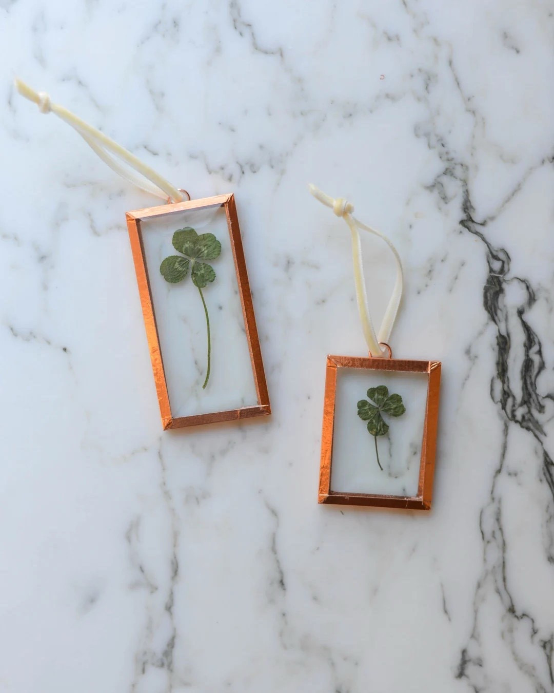 A little luck, wrapped in timeless craftsmanship 🍀 This handmade glass and copper ornament features a real pressed four-leaf clover, framed in beveled glass and finished with an ivory velvet ribbon for an elegant, heirloom feel. Made to order and shipped from Virginia, each piece is truly one of a kind and perfect for adding meaningful charm to your holiday décor or gifting someone special a symbol of good fortune.
#LTKfinds #EtsyFinds #HandmadeDecor #PressedFlowers #FourLeafClover #MeaningfulGifts #HolidayDecor #ShopSmall #VirginiaMade

#LTKHome #LTKHoliday #LTKSeasonal