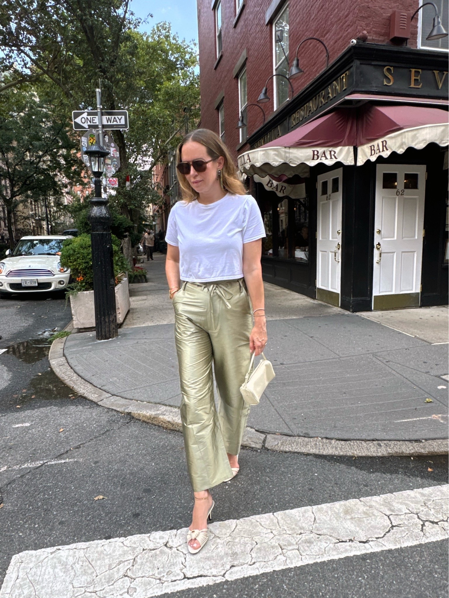 The coolest pants. I'm wearing the size 2 (they come in 3 sizes: 1, 2 and 3) and they fit perfect. I'm typically a size 28 and in between a 4-6. 

The shirt is the best for a high waisted number when you don't want the extra bulk from tucking in. I'm in a size medium. Runs true to size. 

I sized up 1/2 a size in the mules.