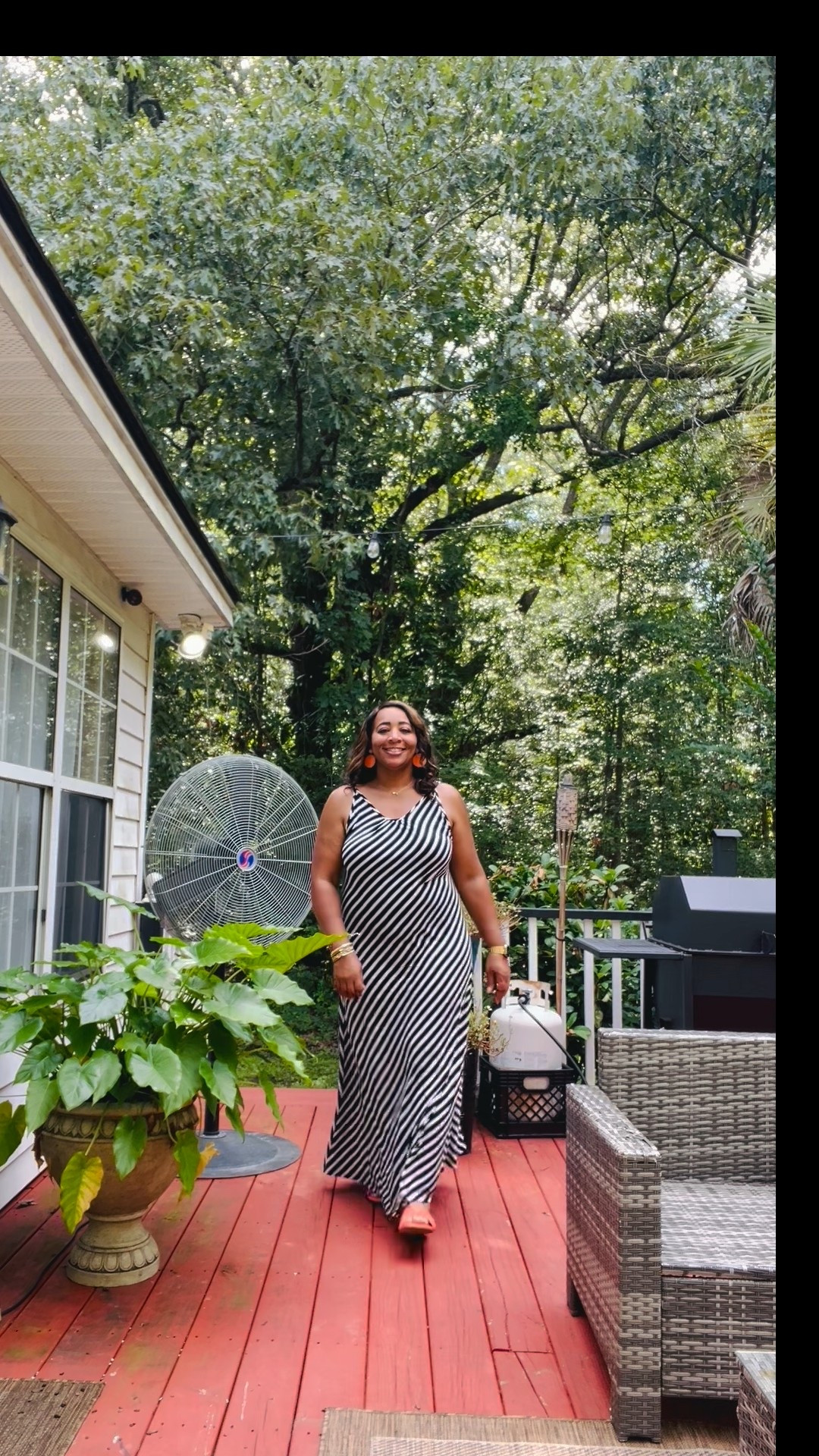 🌟 **Style Spotlight** 🌟
Get ready to turn heads with this stunning look! Our beautiful model channels effortless chic in a black-and-white striped maxi dress which can be paired with a vibrant orange/red clutch—perfect for adding a pop of color to your day! 💃✨
Whether you’re sipping coffee by the window or heading out for brunch with friends, this outfit is as versatile as it is stylish. 🌼 The look is tagged below! 
🪑 And can we talk about this cozy outdoor vibe? 🍂. 
👉 Save this post for your next styling inspo and tag us to share how you put your own spin on this look! 
#FashionInspo #StyleGoals #OOTD #HomeDecor #MaxiDress #FashionBlogger #ShopNow 


#LTKFindsUnder50 #LTKSeasonal #LTKPlusSize