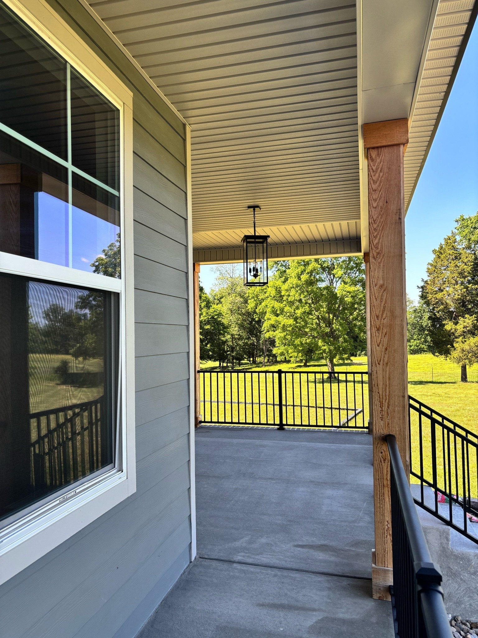Soffit , cedar posts, black handrails

#LTKSeasonal